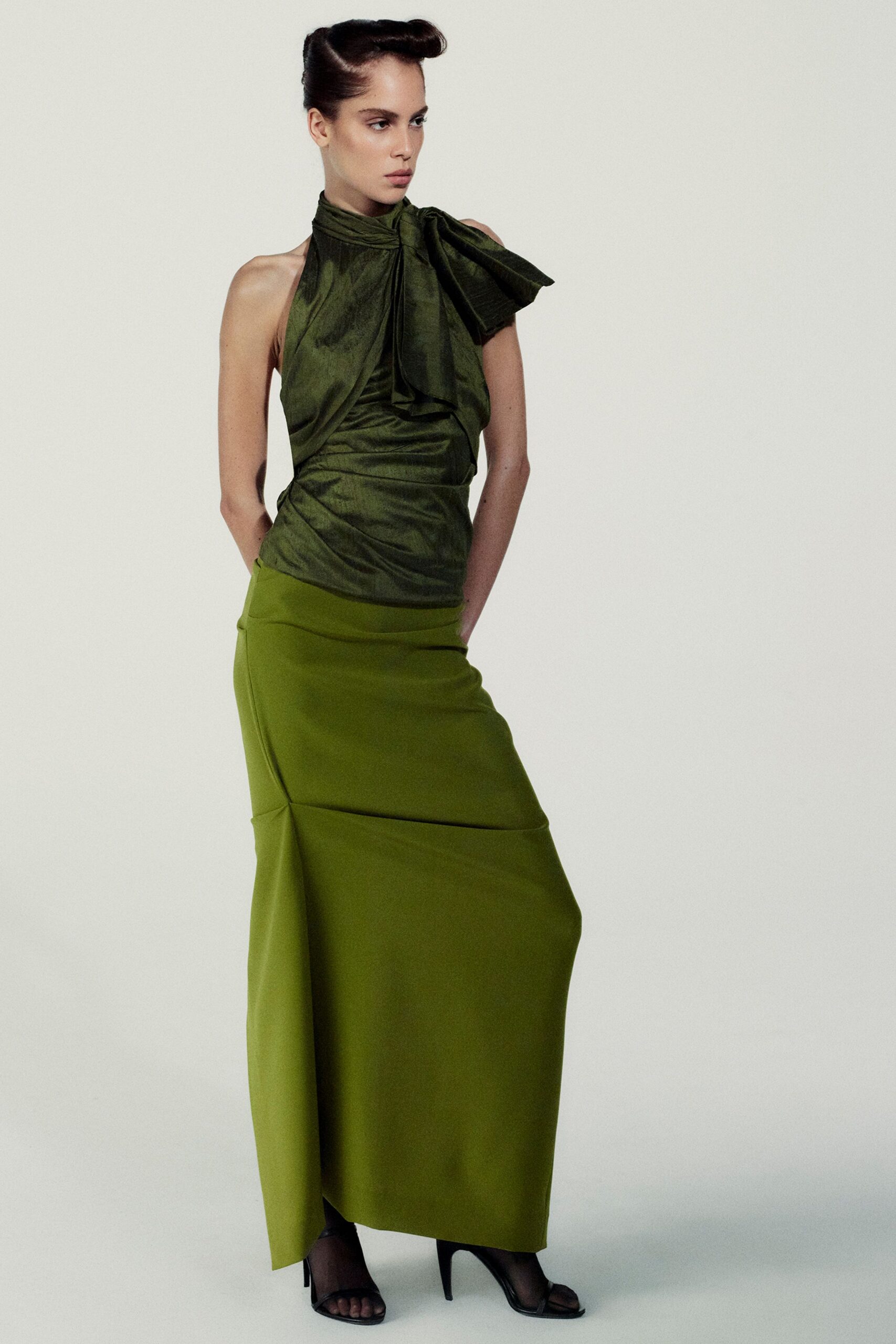 green silk sleeveless high-neck fitted draped top
