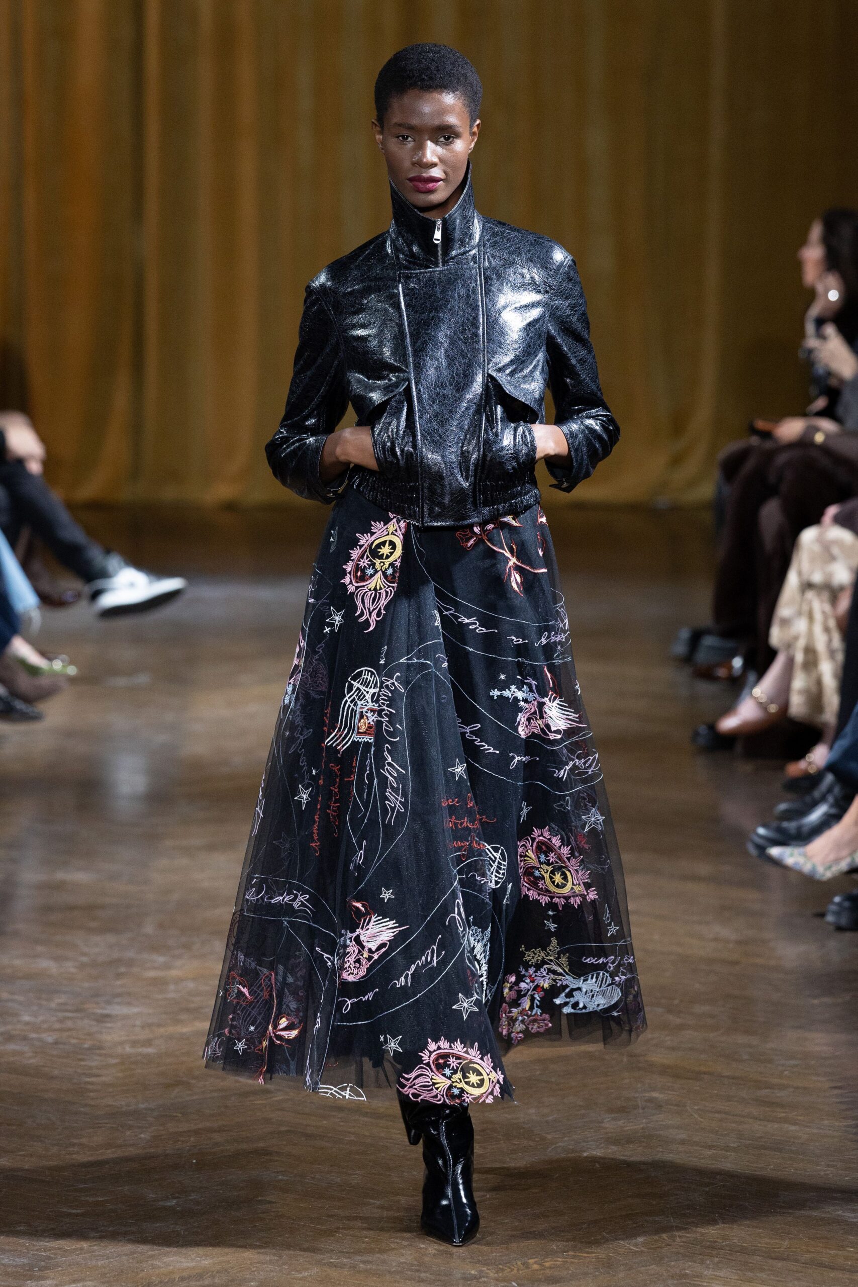black leather jacket with embroidered skirt
