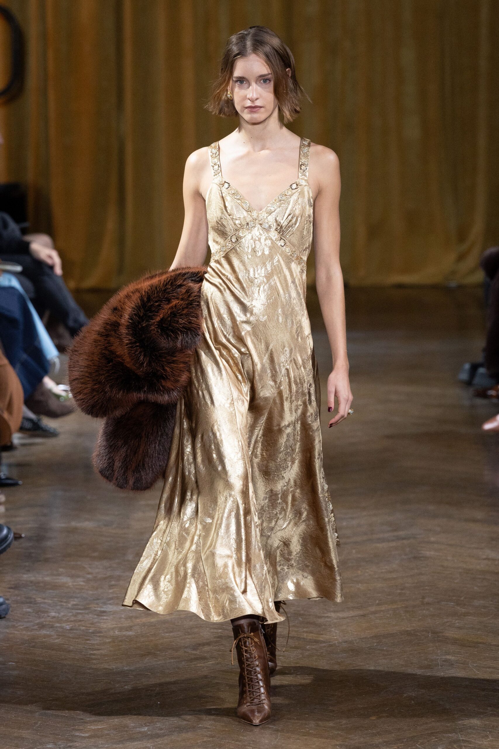 gold silk sleeveless v-neck fitted flowing shiny dress