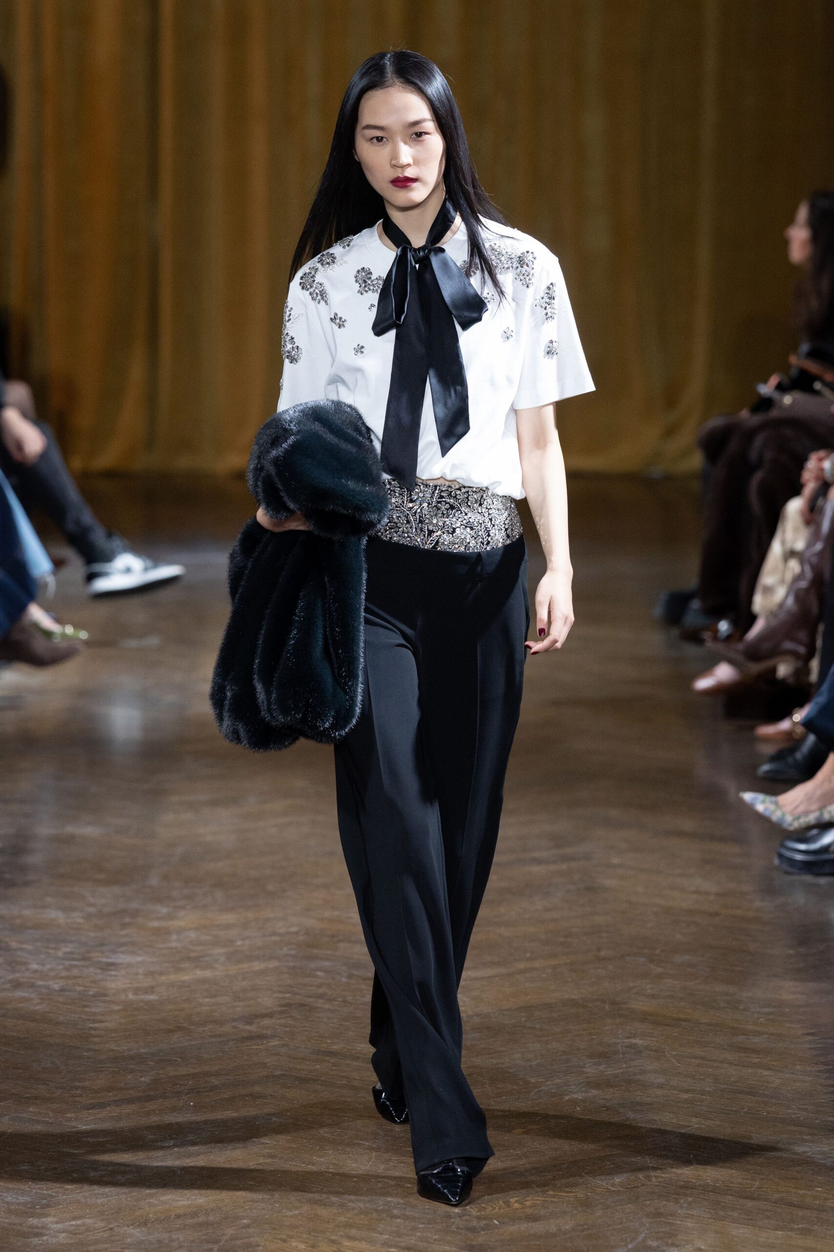 white embroidered shirt black pants