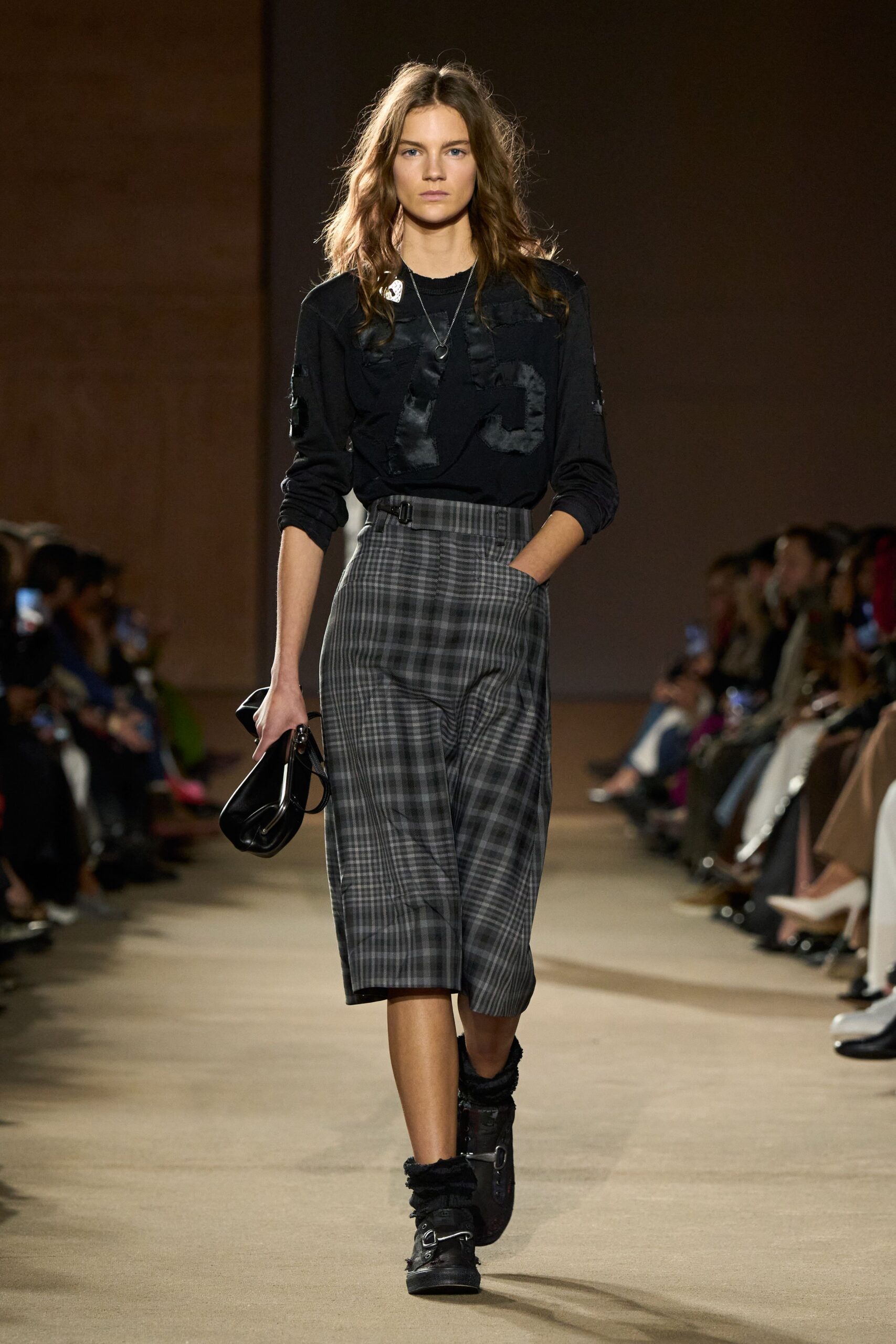 black fitted top gray wide-leg pants
