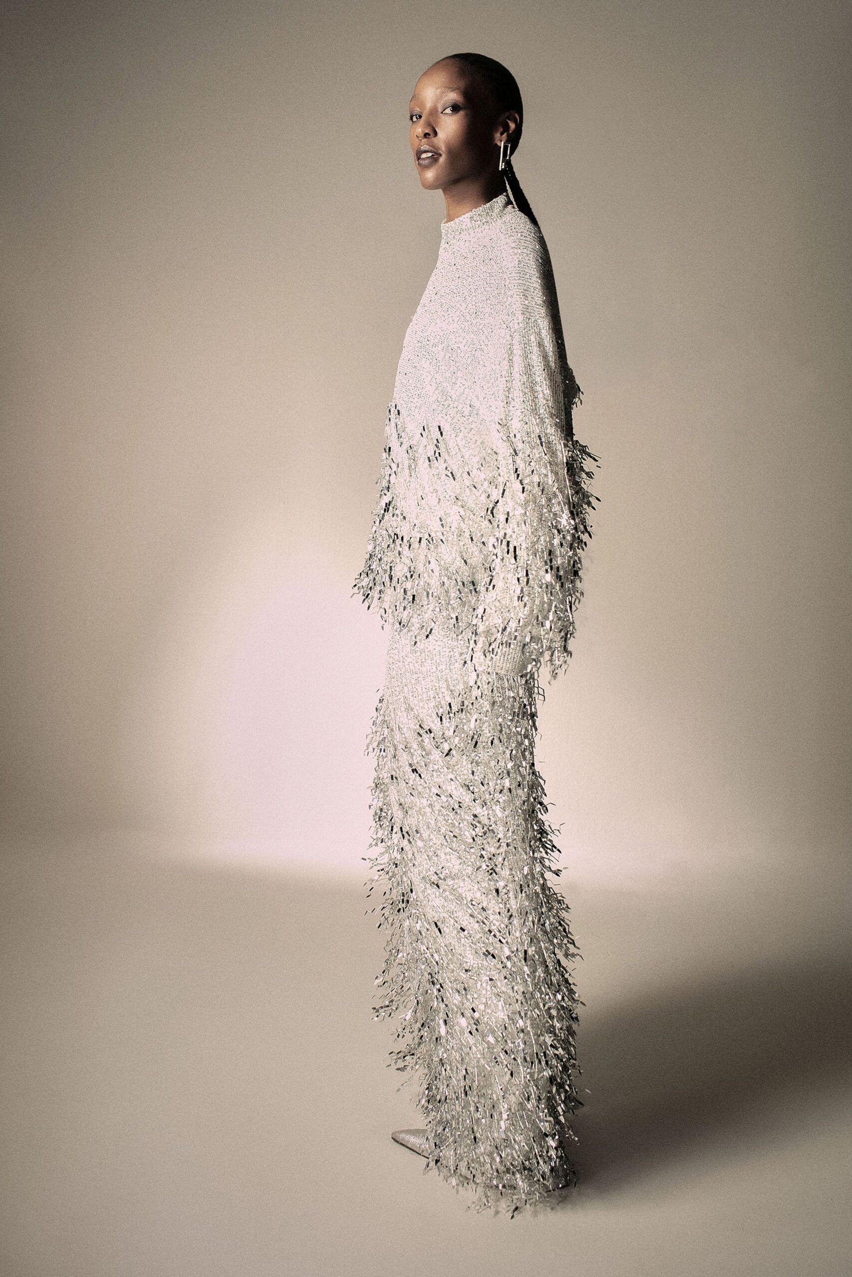 silver sequined fringed gown