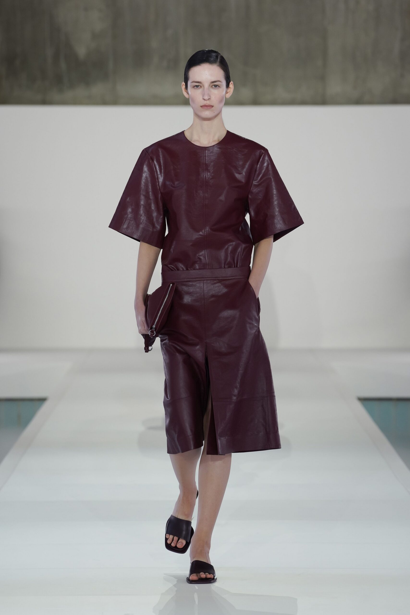 maroon leather short-sleeve collared fitted top