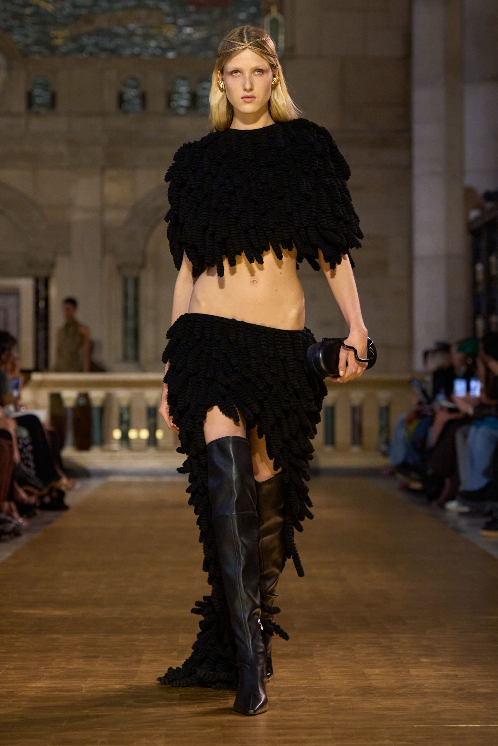 black fringed top and mini skirt