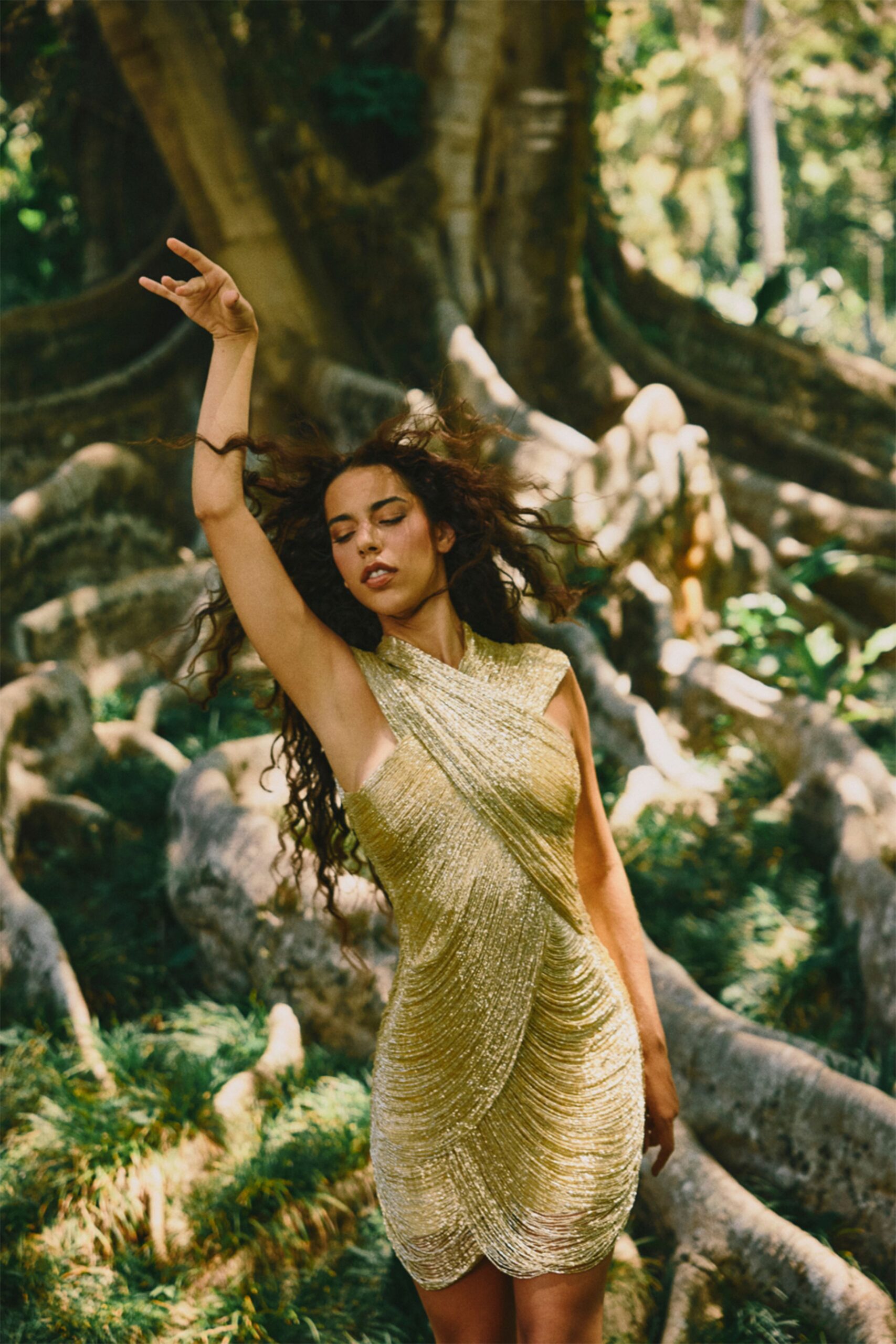 fitted gold sleeveless dress