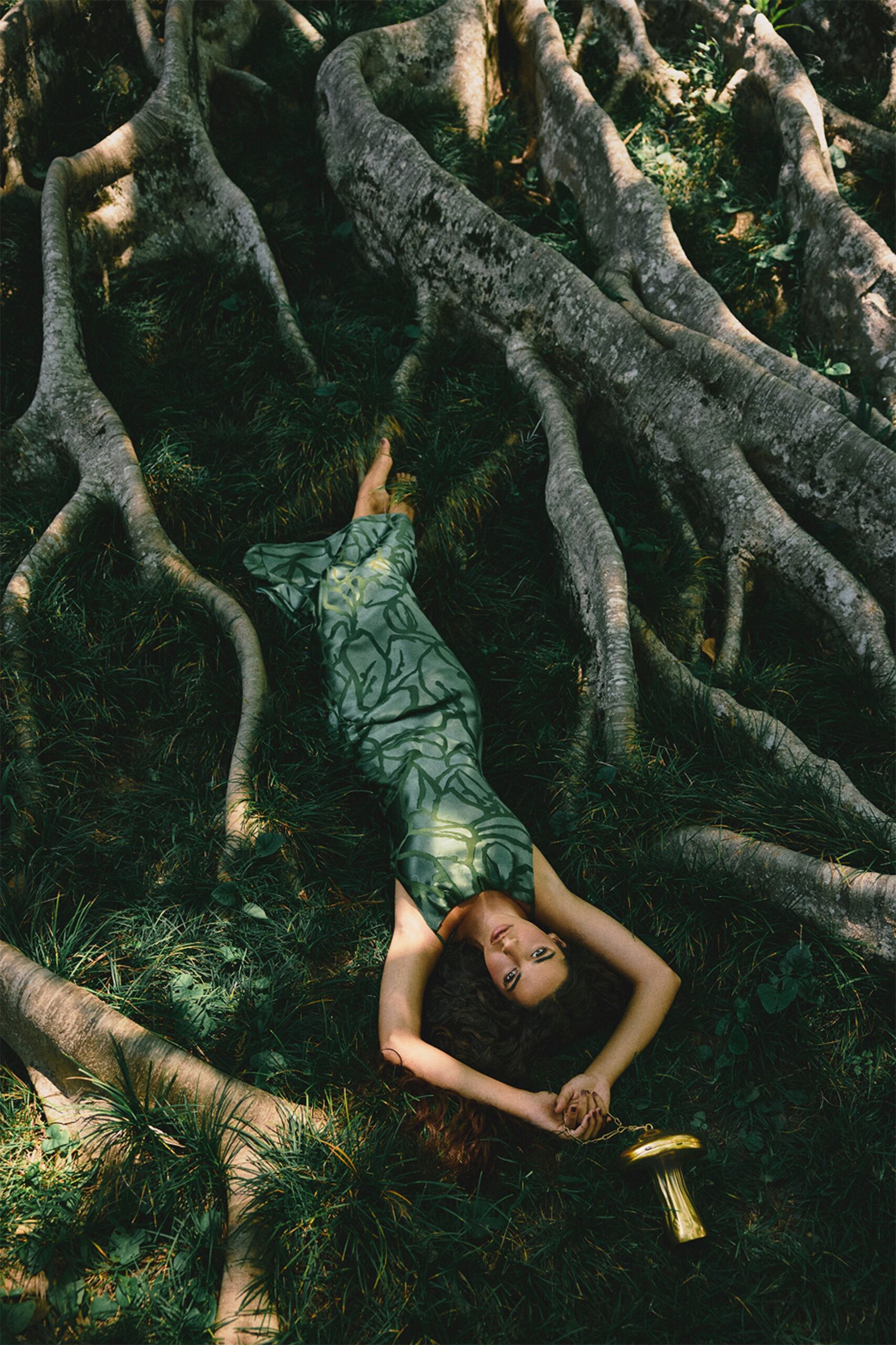 green silk sleeveless gown
