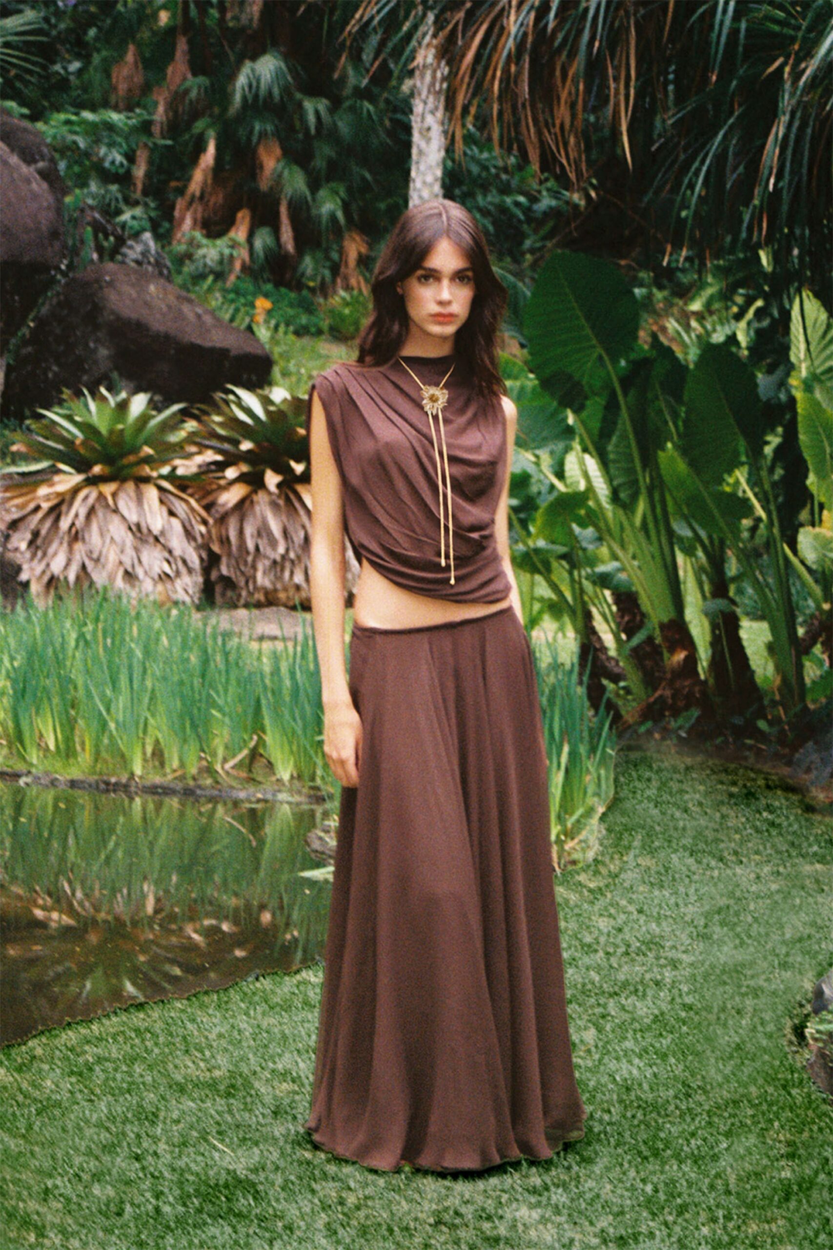 brown silk draped top and flowing skirt
