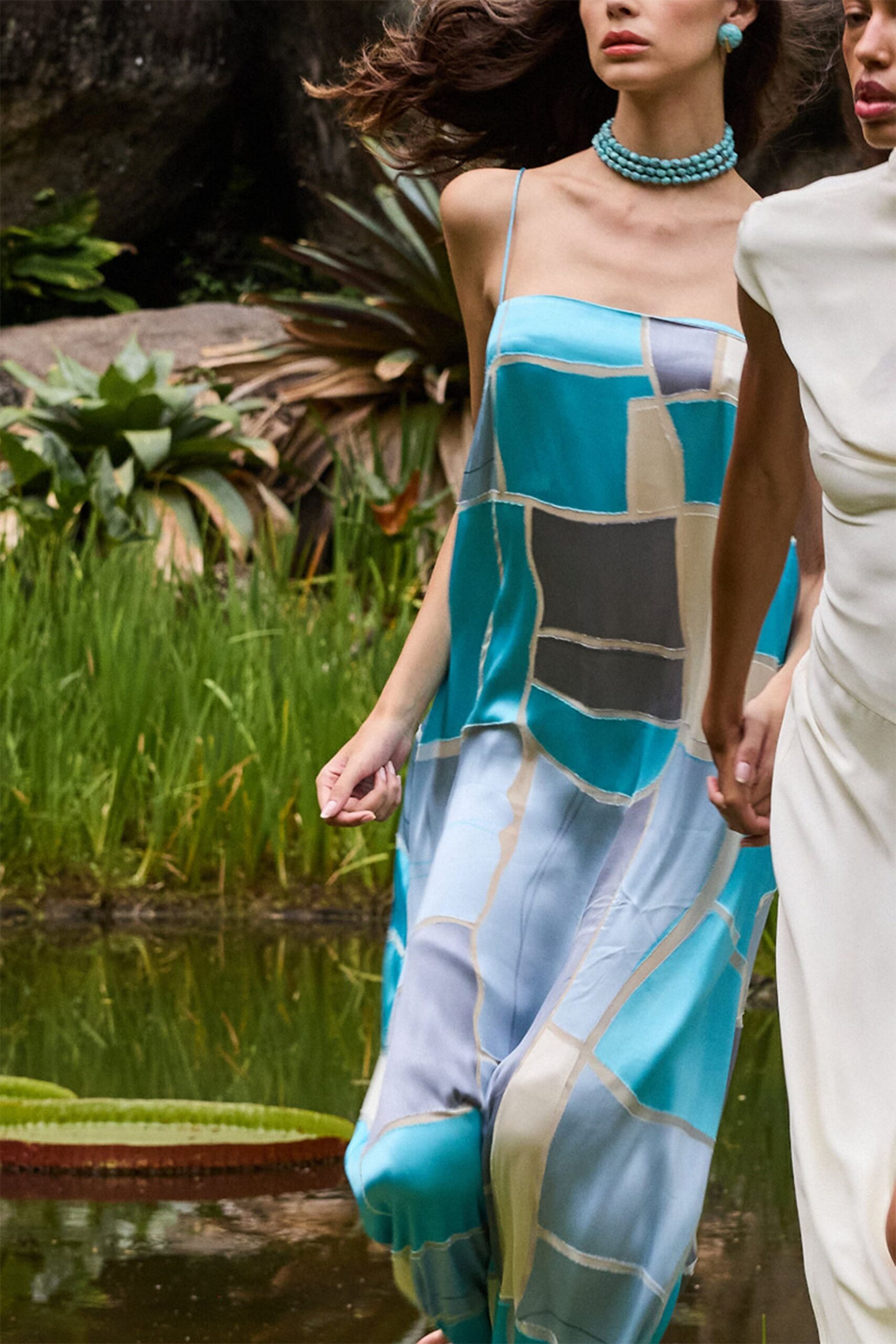 blue printed maxi dress and white midi dress