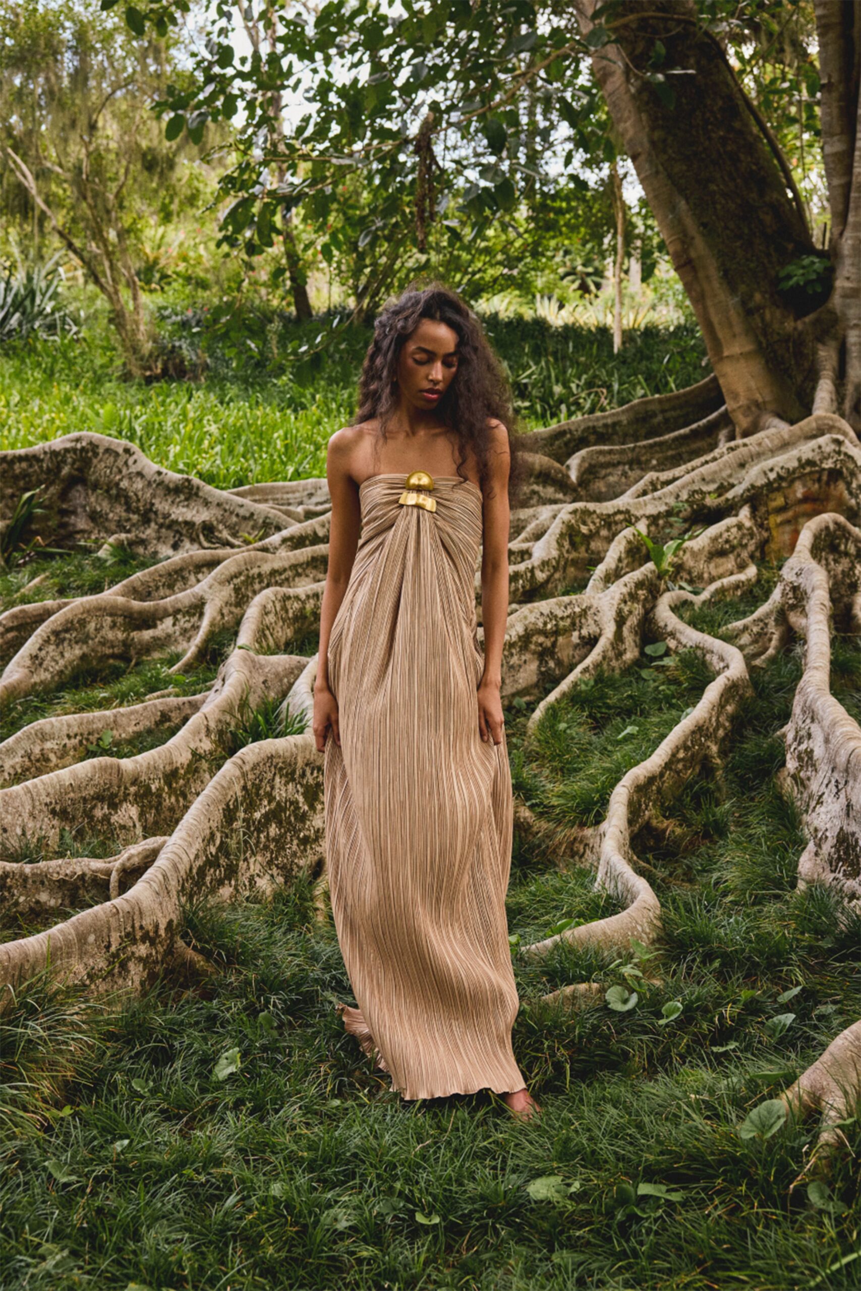 gold silk strapless pleated gown