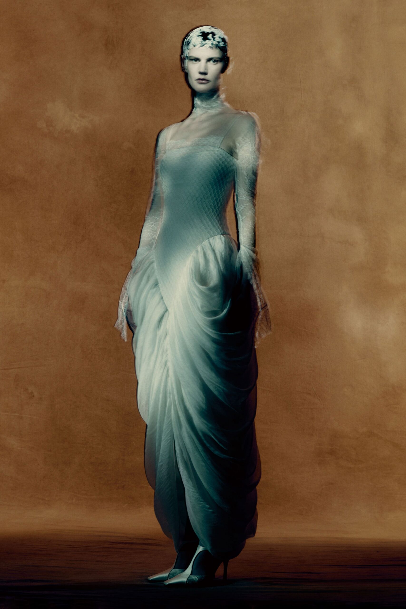 white silk long-sleeve high-neck fitted pleated draped gown