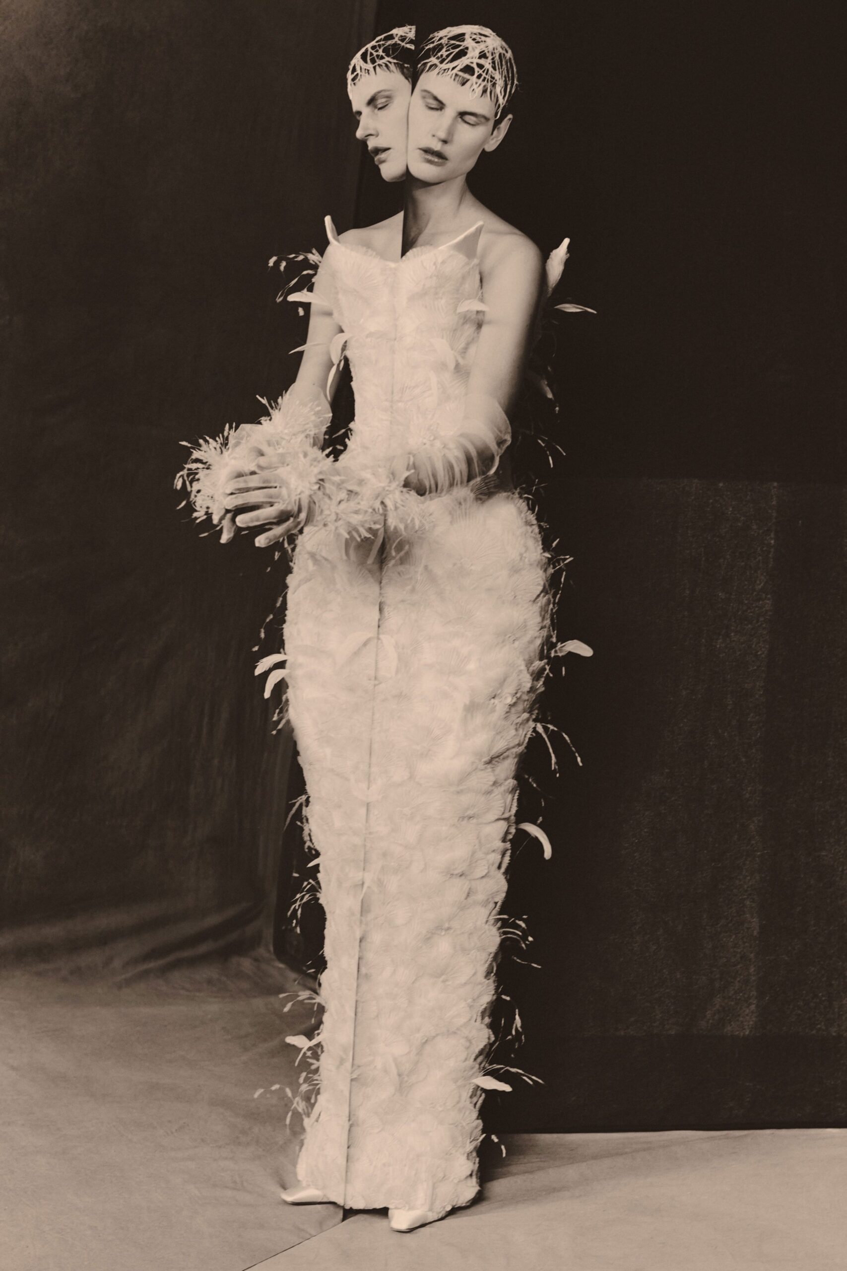 white ruffled gown with headpiece