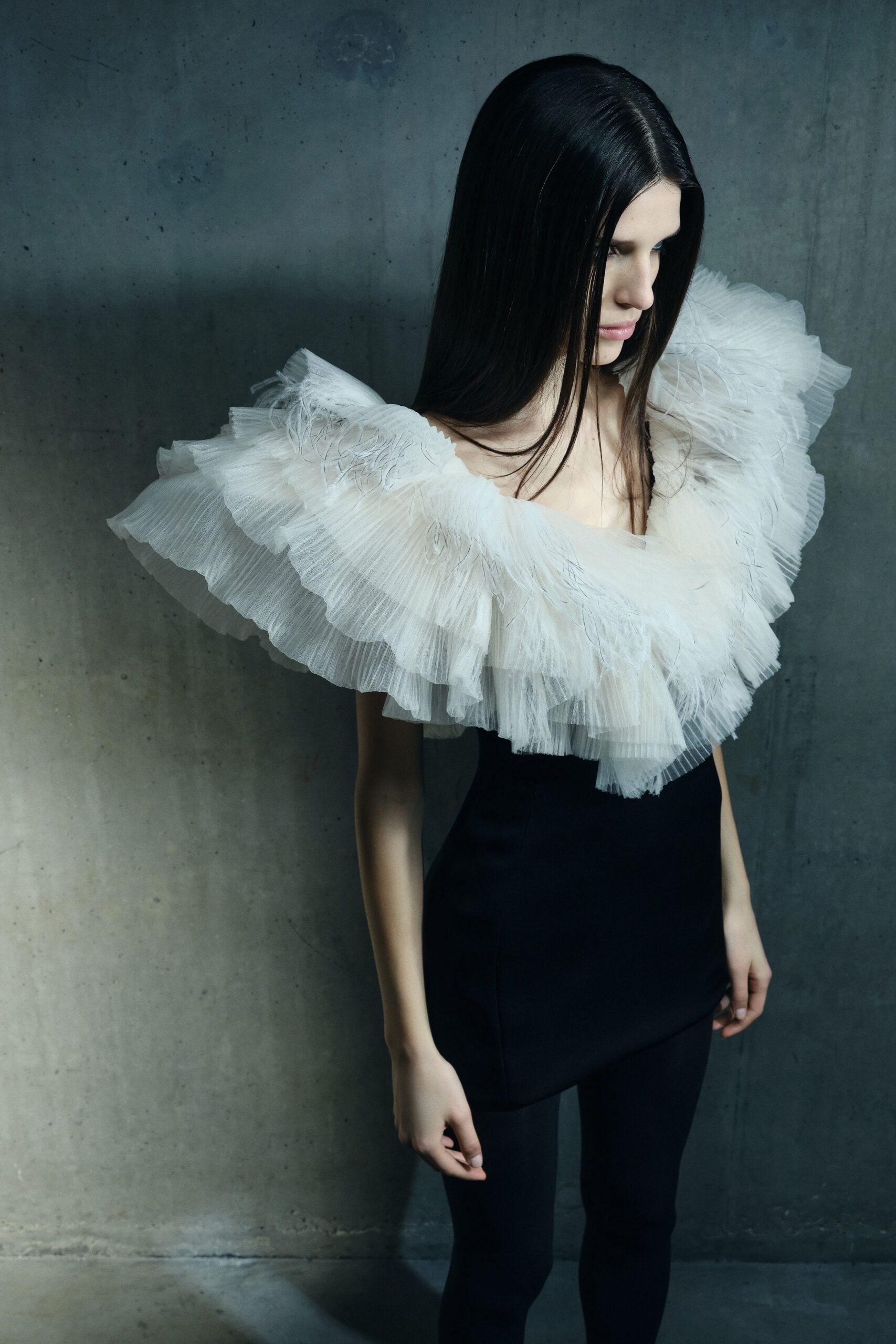 white chiffon sleeveless v-neck fitted ruffled flowing top