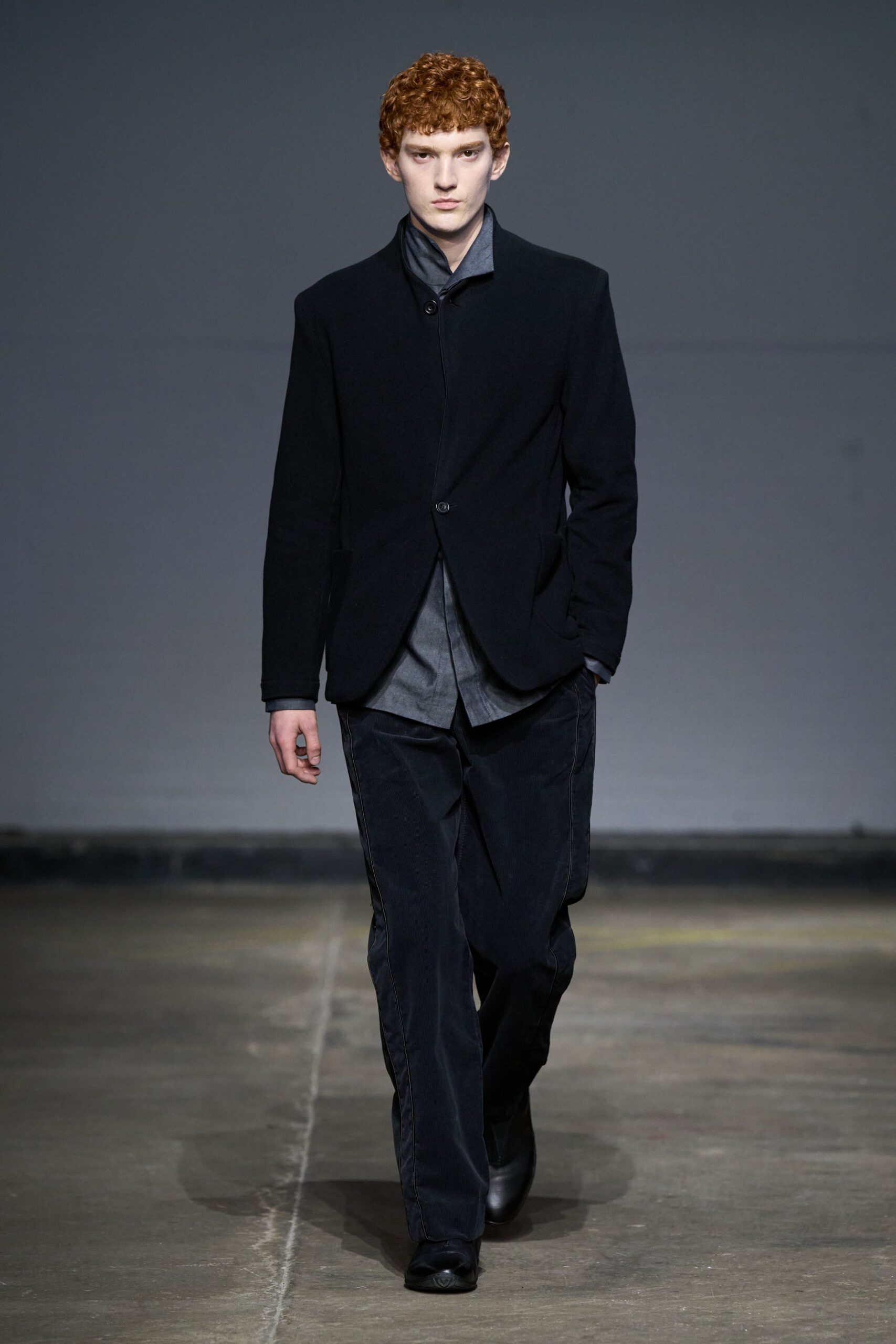 black tailored blazer with gray shirt