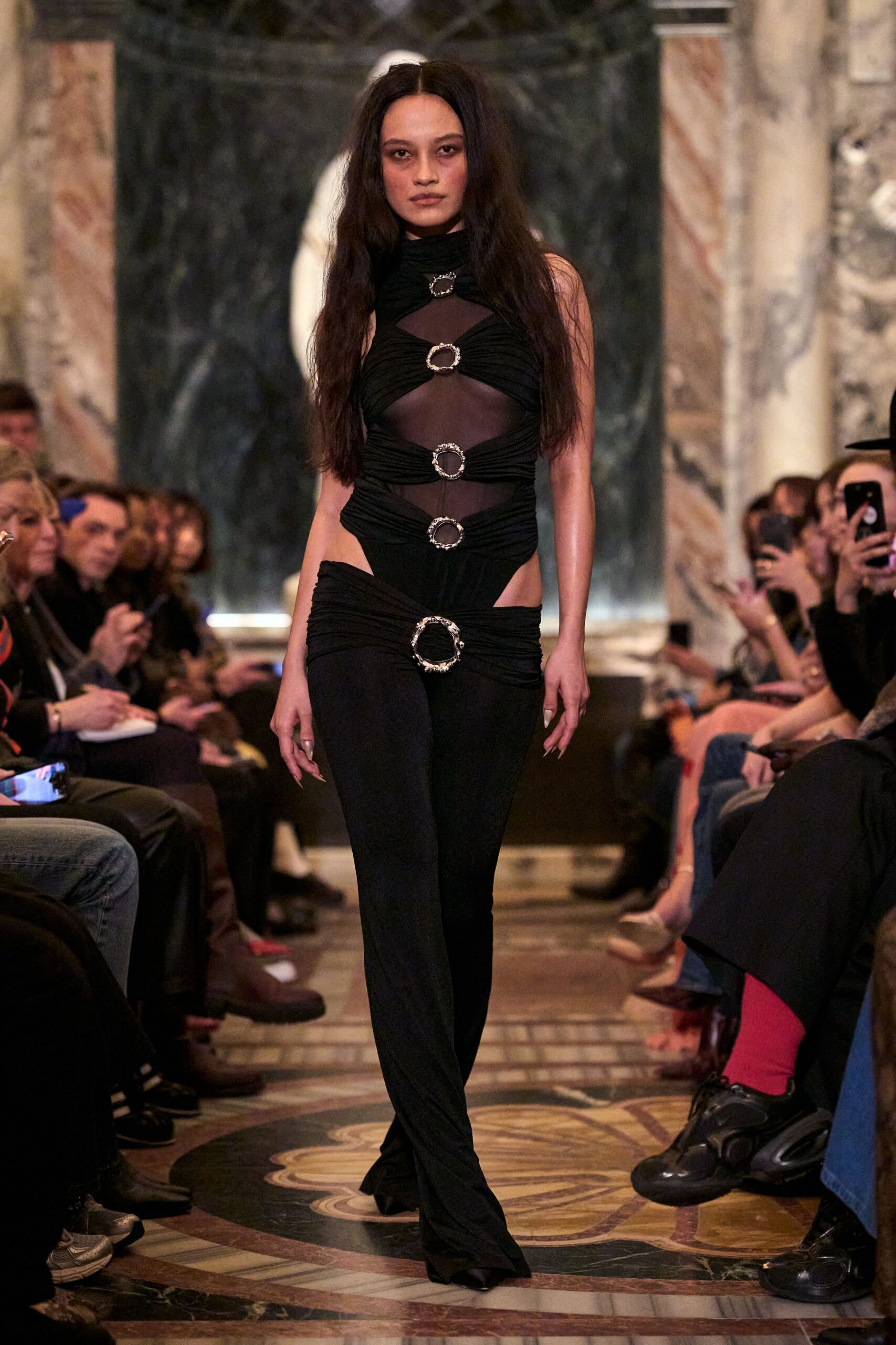 black fitted sleeveless catsuit
