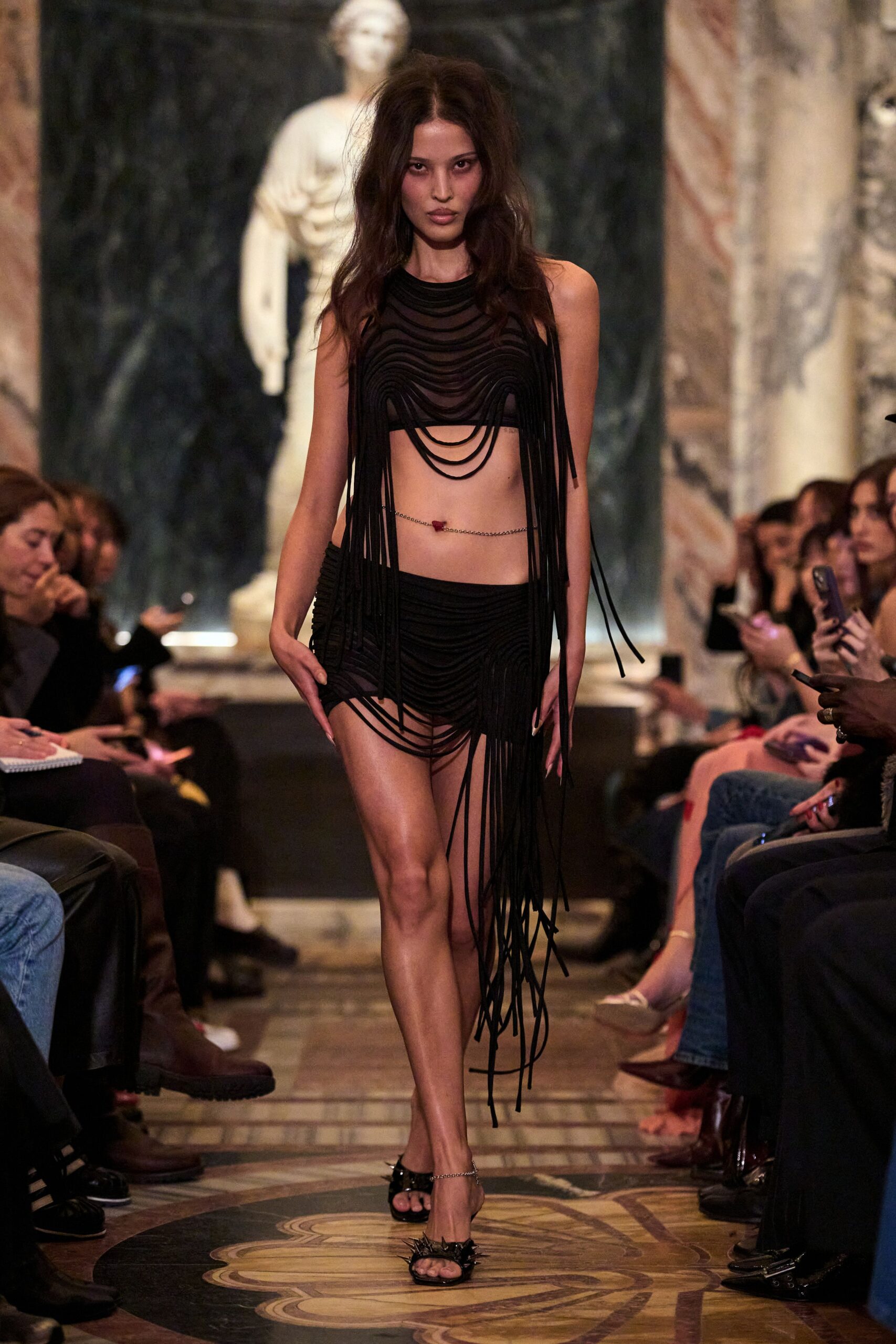 black fringed top and skirt