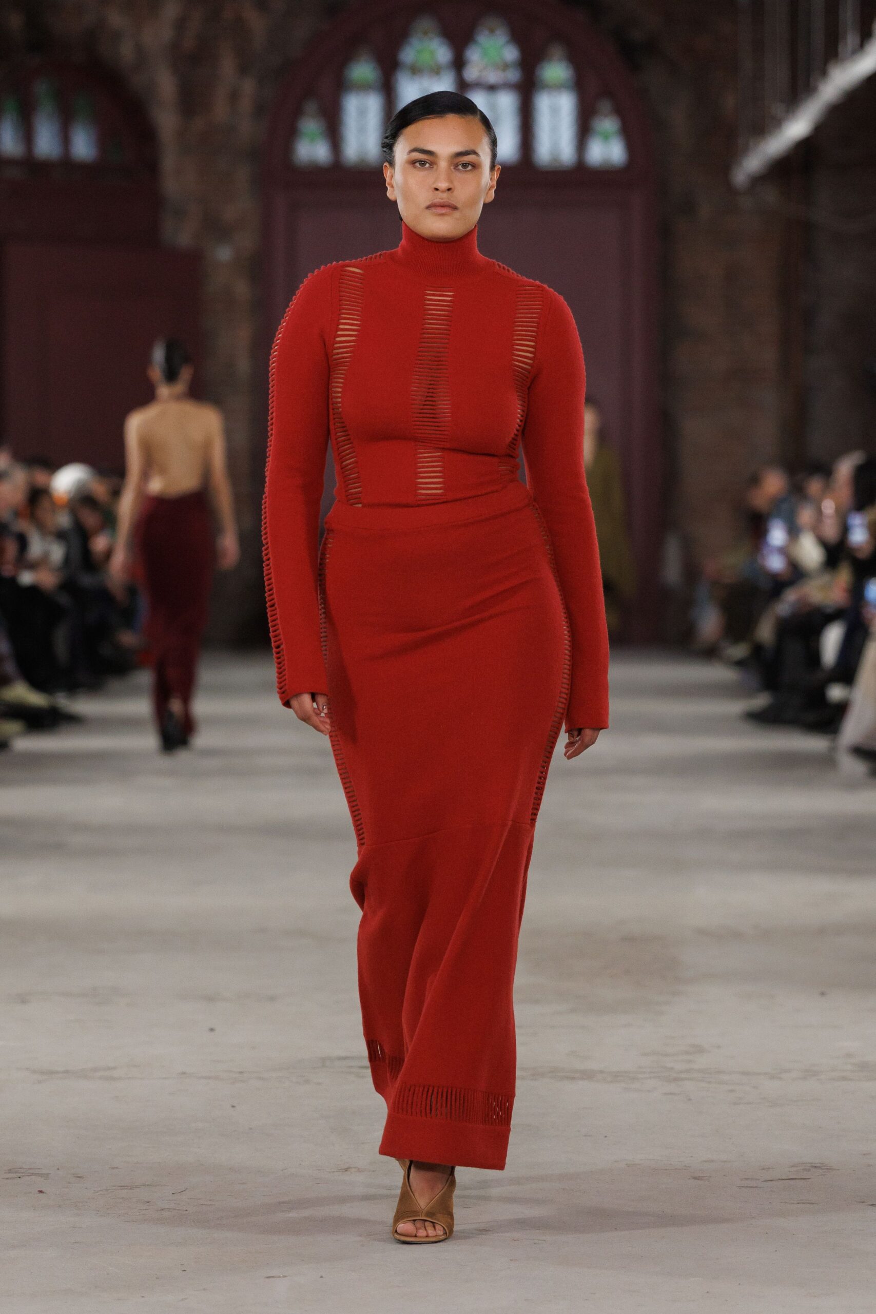 red fitted long-sleeve dress with cutouts