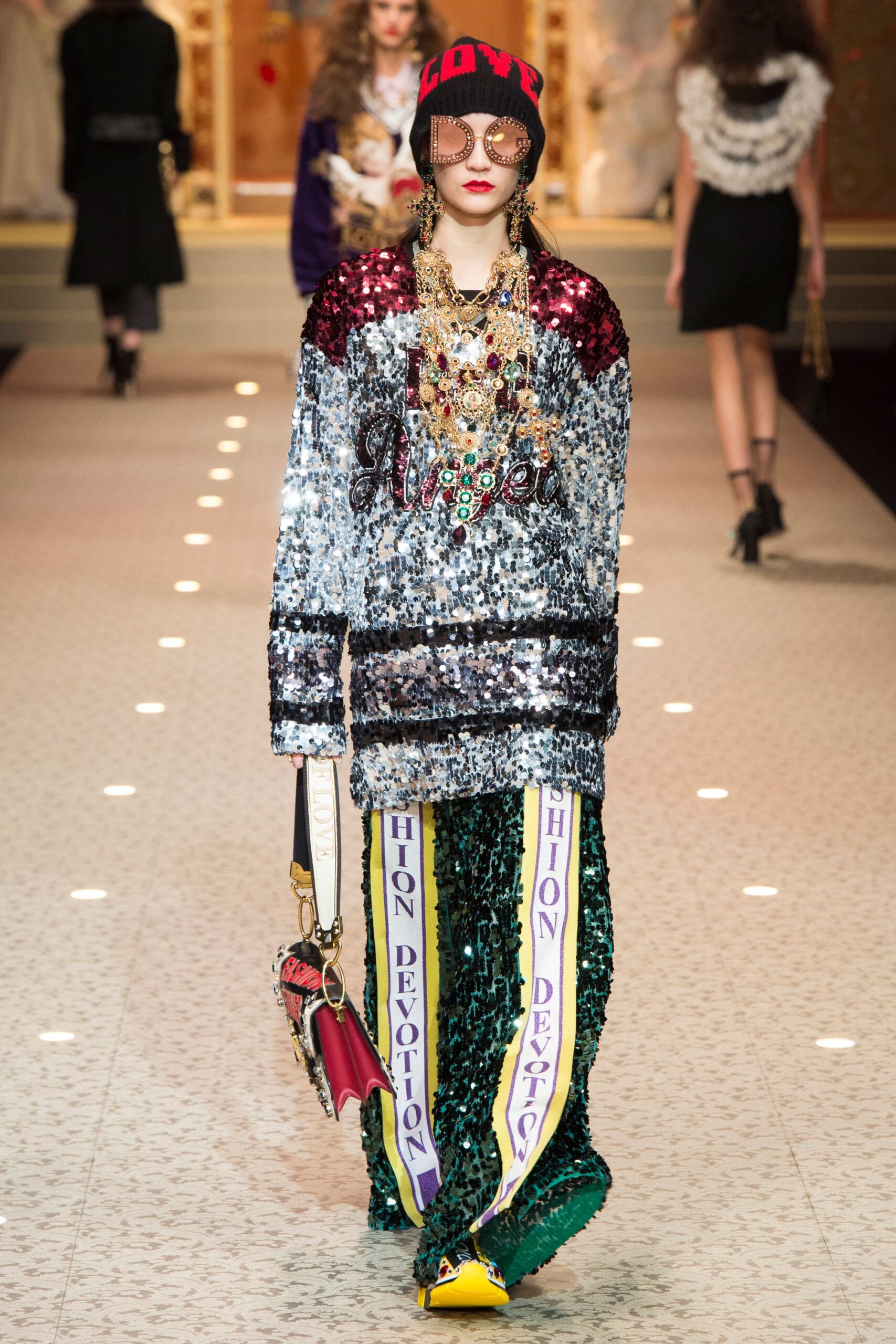 multi-colored sequin top and green pants