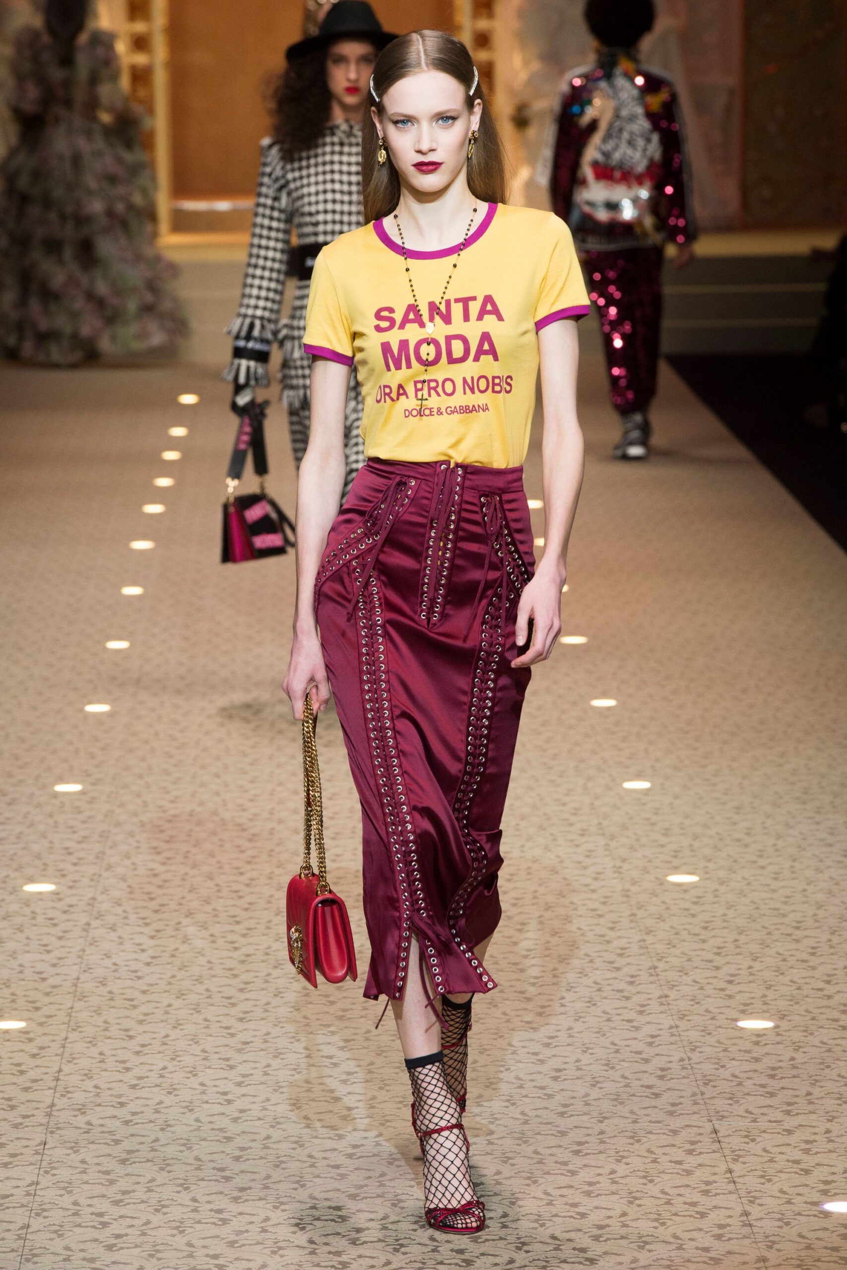 yellow printed t-shirt and burgundy skirt