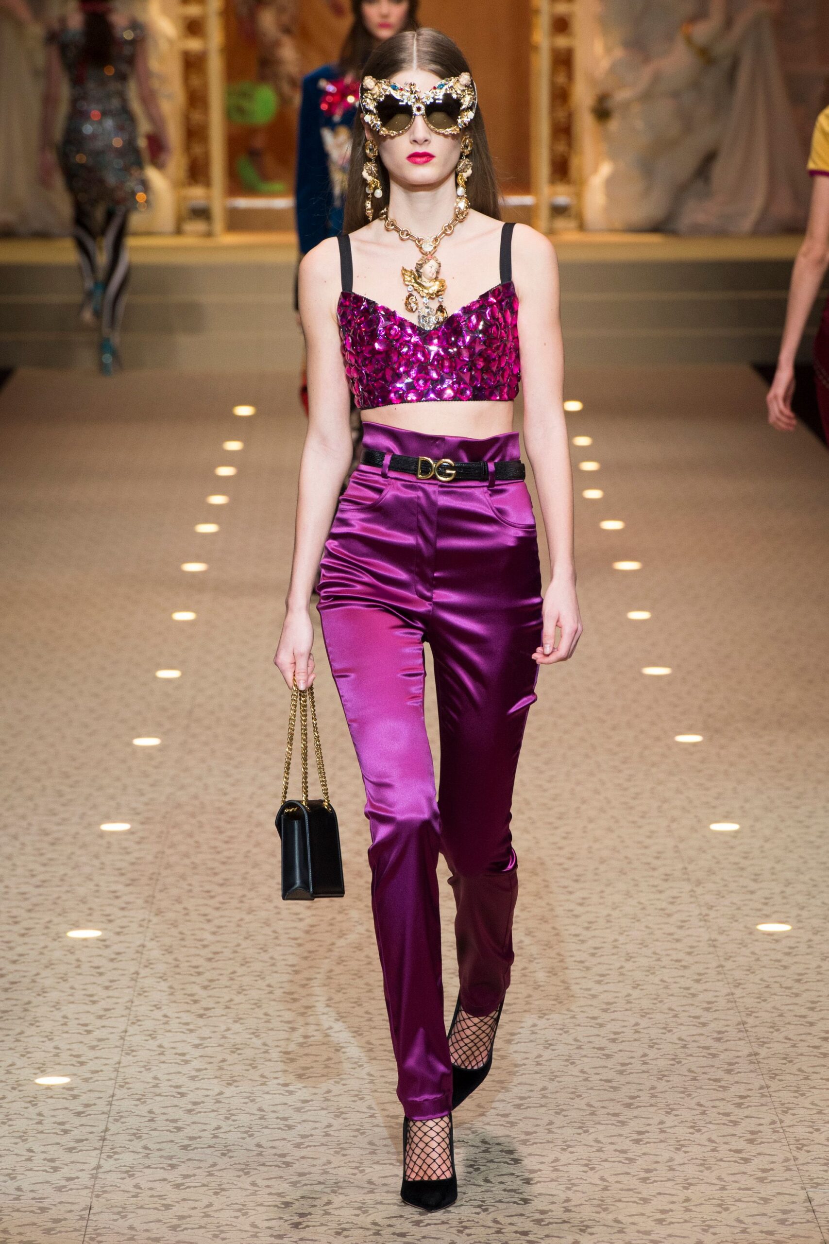 pink sequin crop-top with purple pants