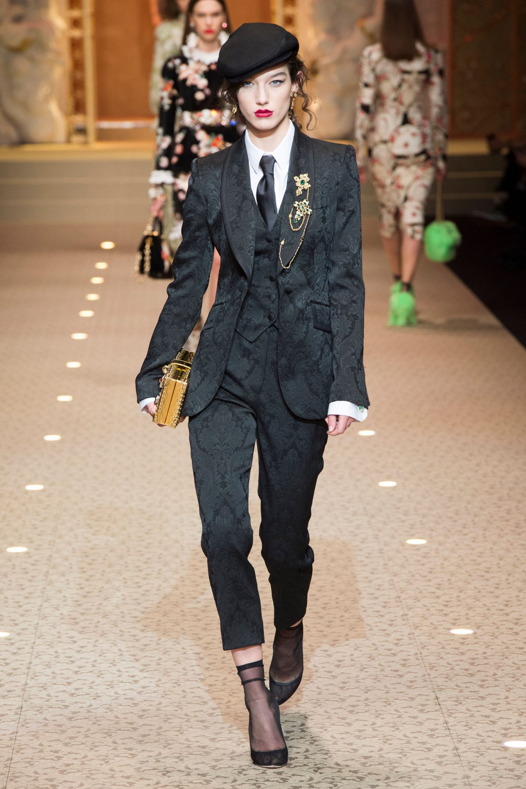 black embroidered suit with beret