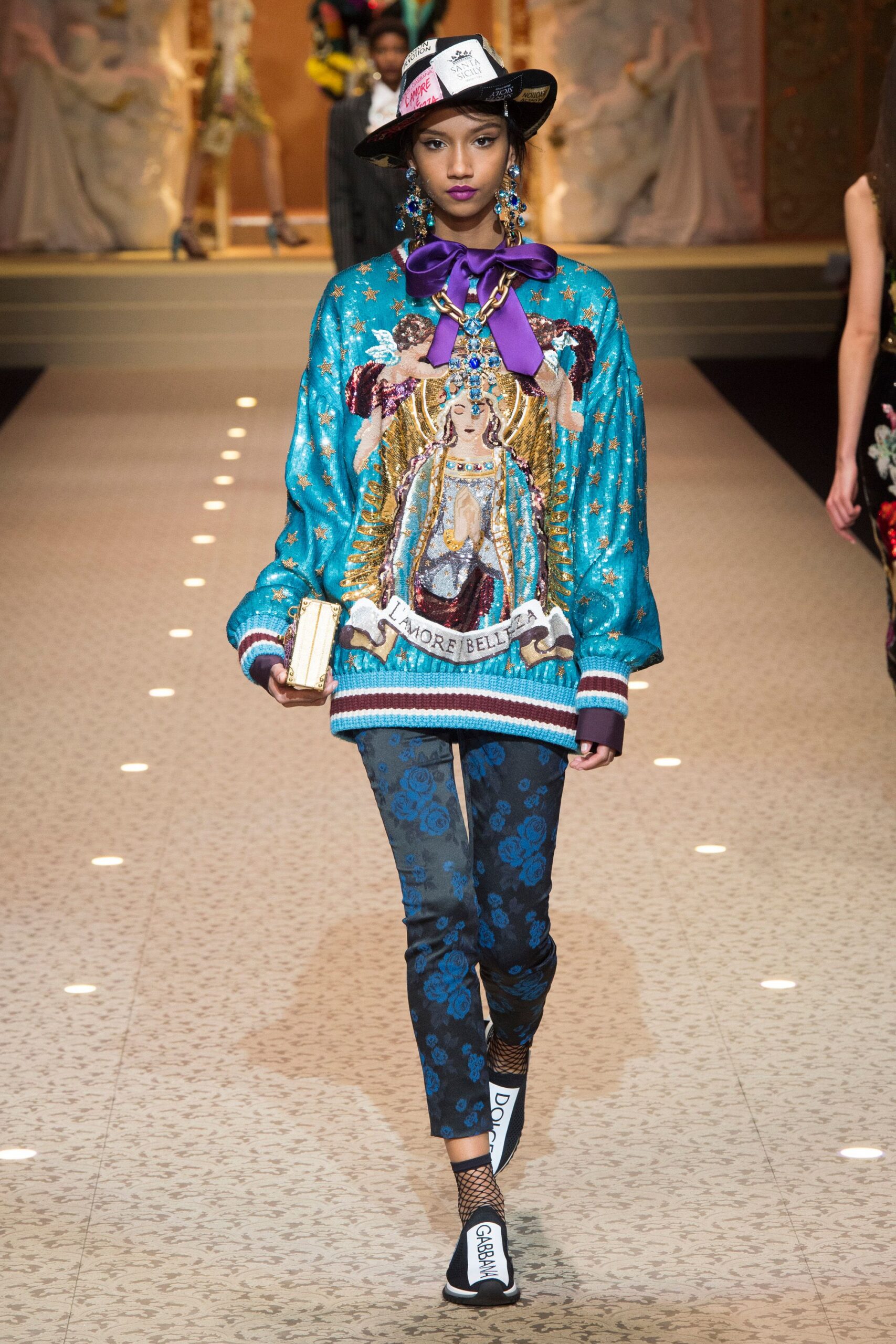 blue embroidered sweater with flared pants