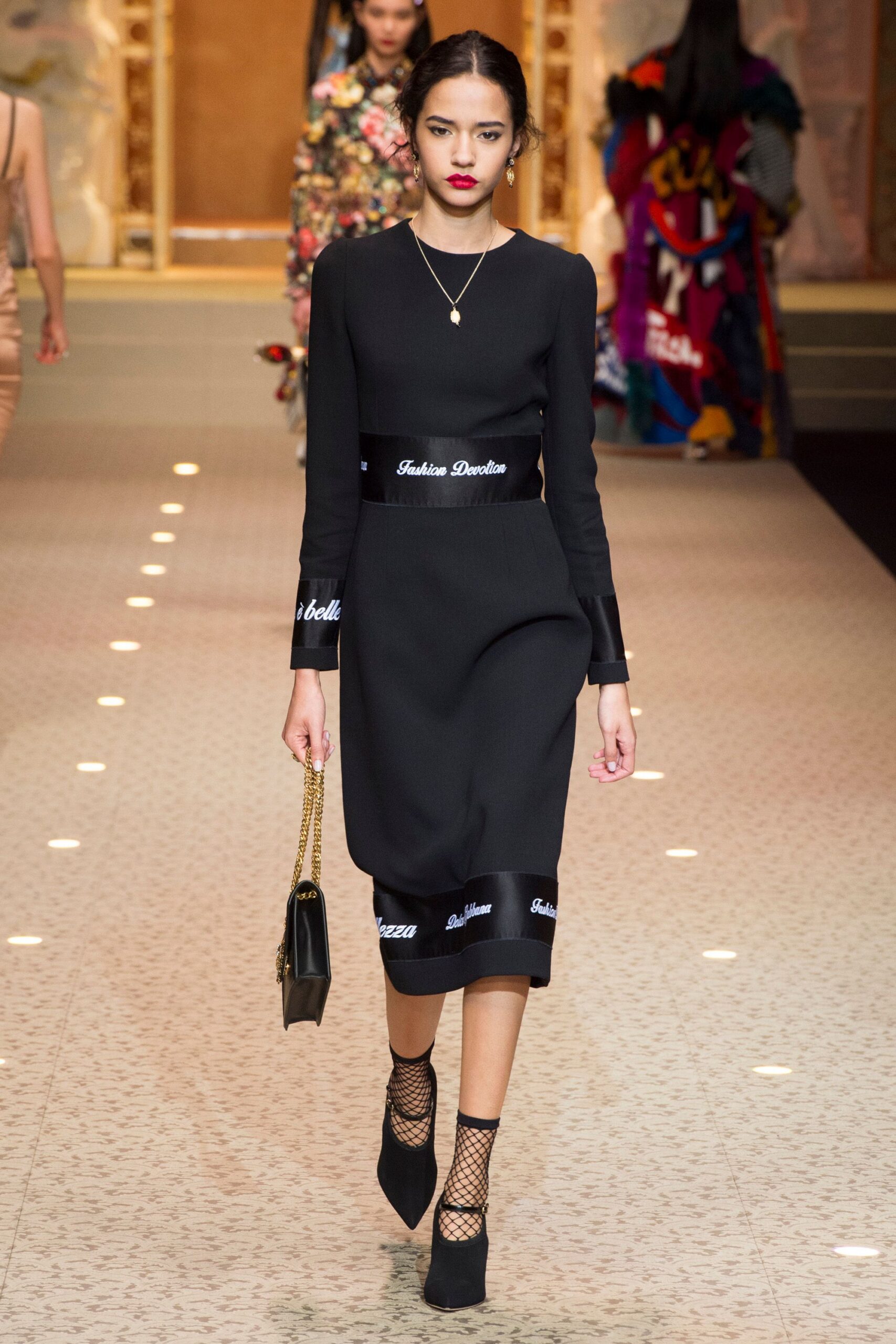 black fitted midi dress with accessories