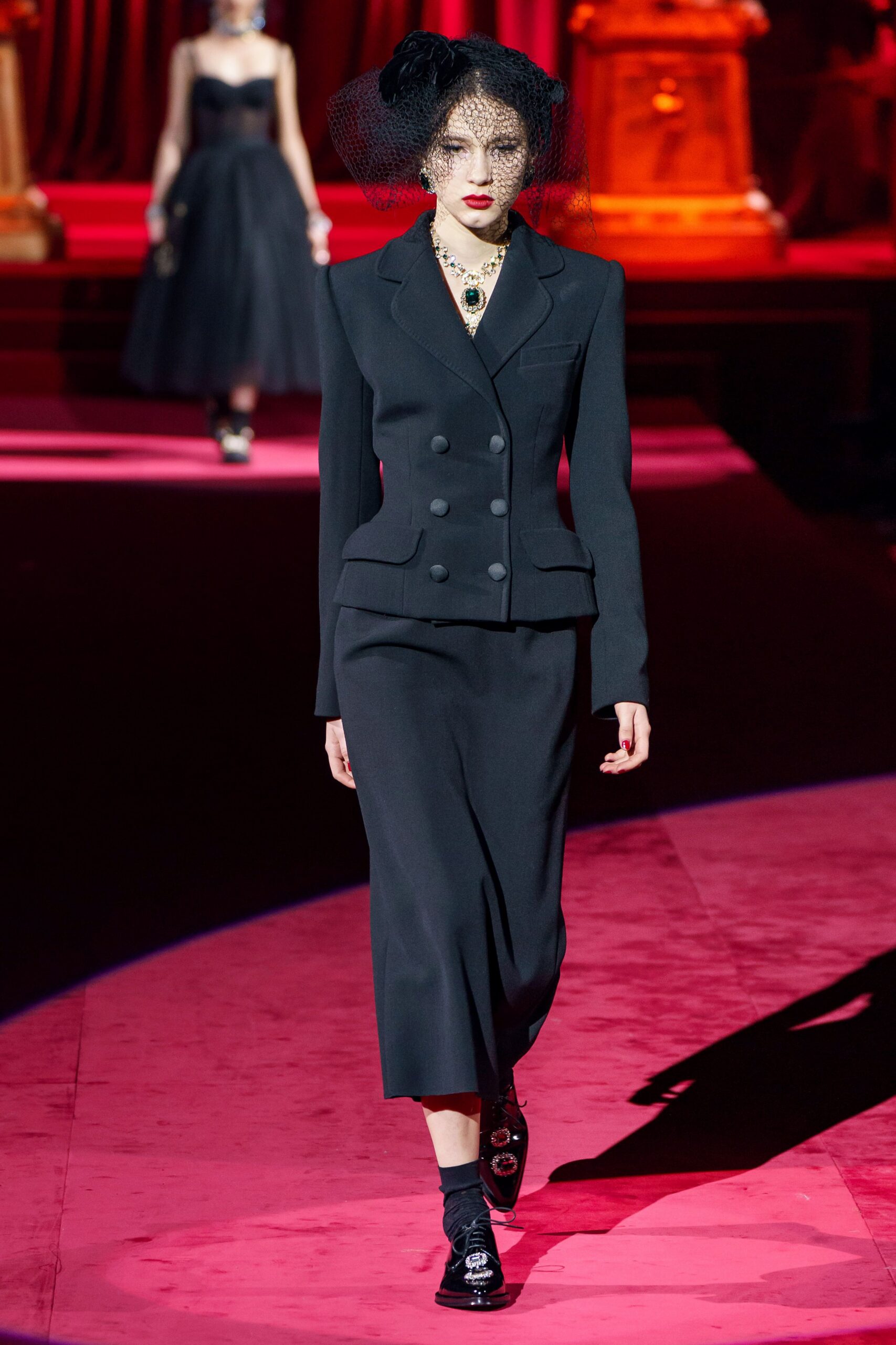 black tailored suit with midi skirt