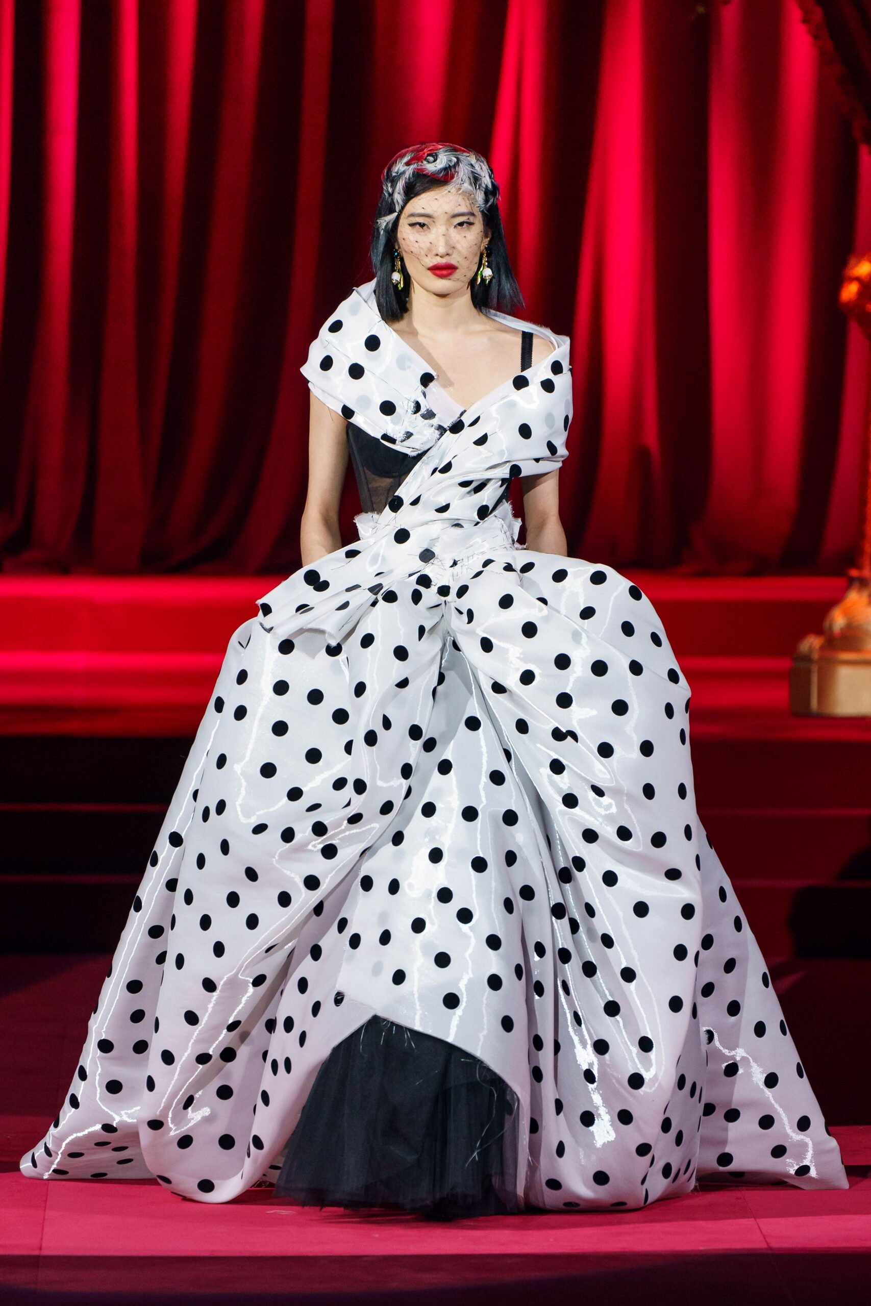 white and black polka-dot gown