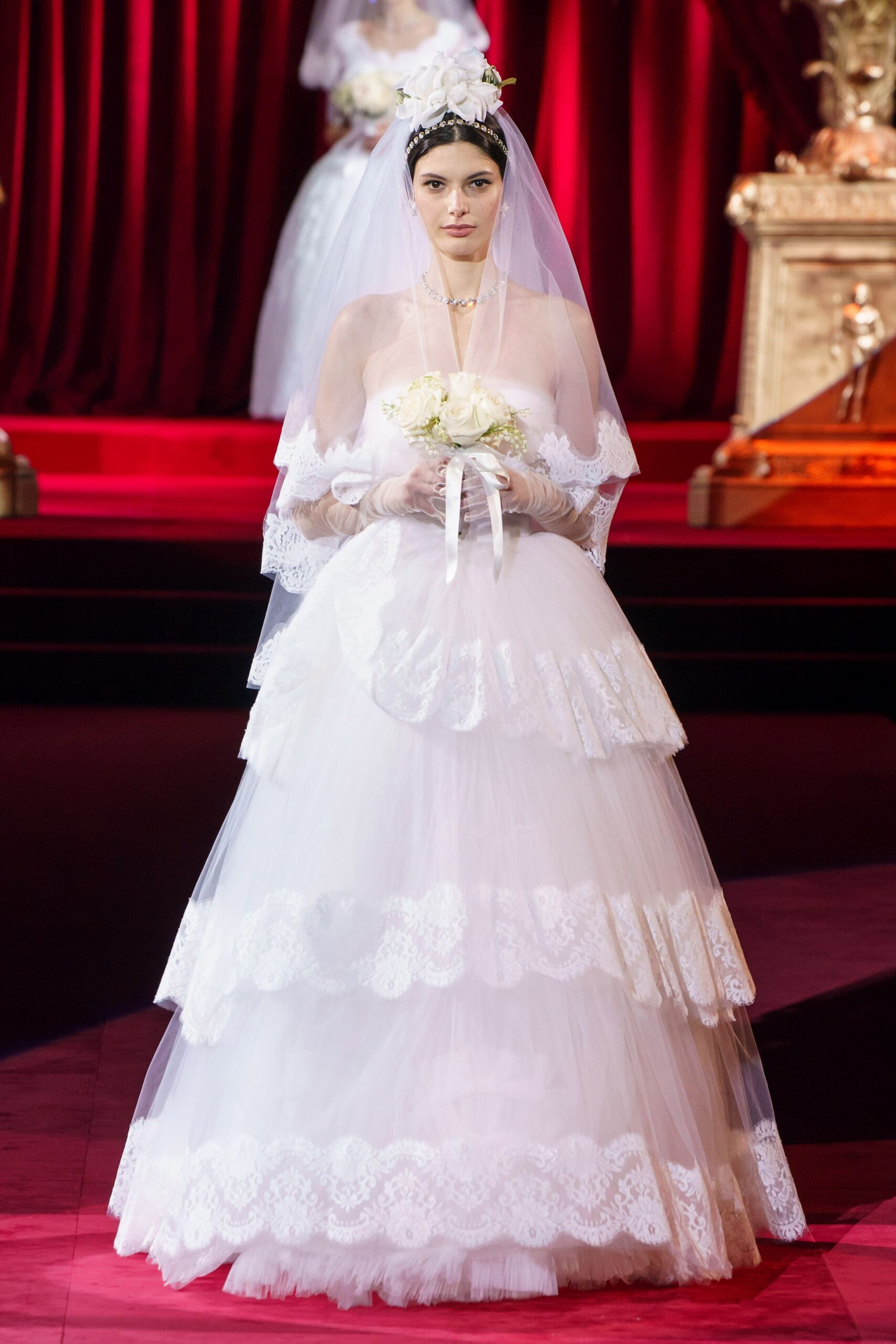 white tiered tulle gown with veil