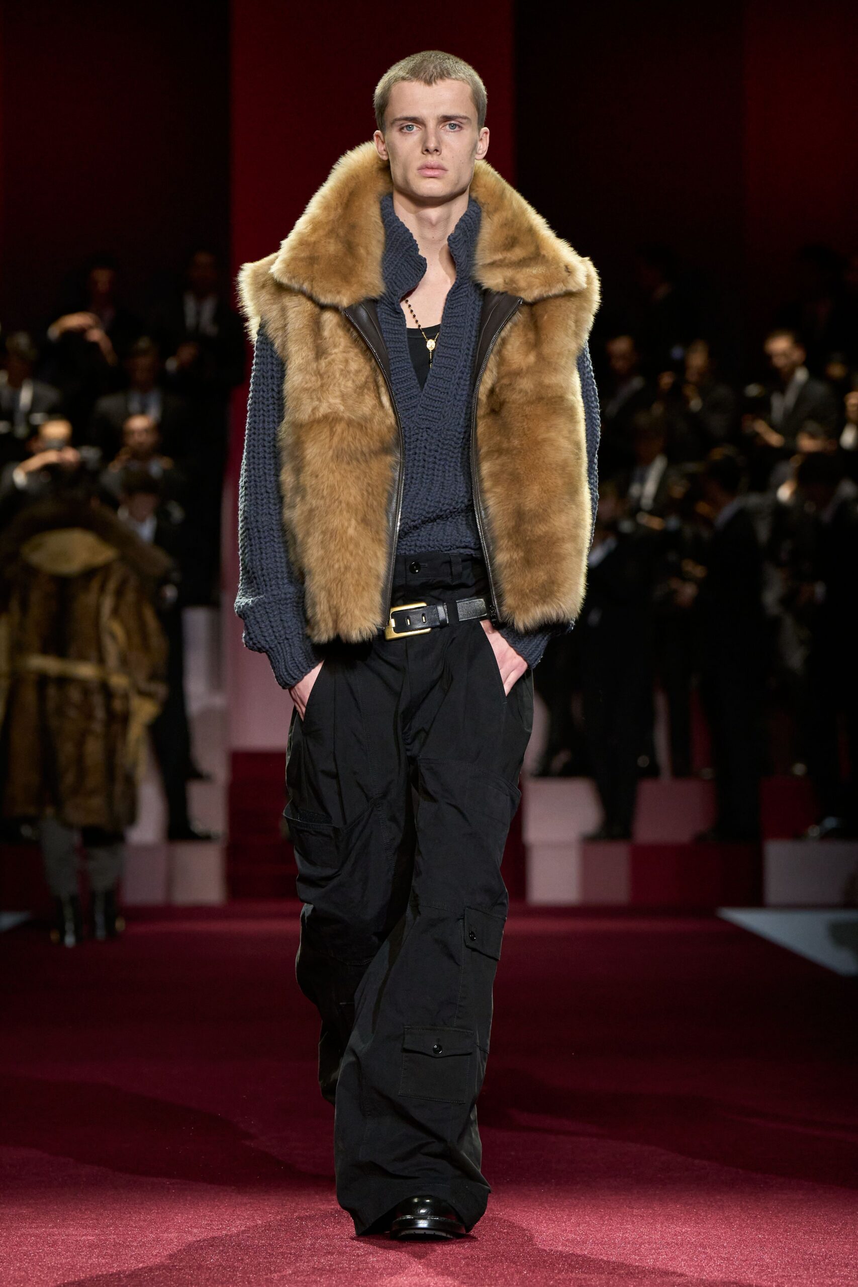 brown fur vest blue sweater black pants