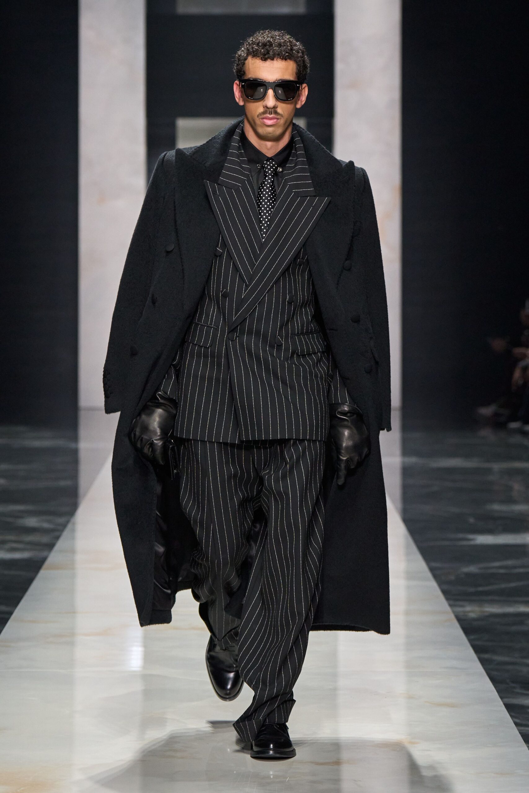black wool long-sleeve collared structured buttoned coat