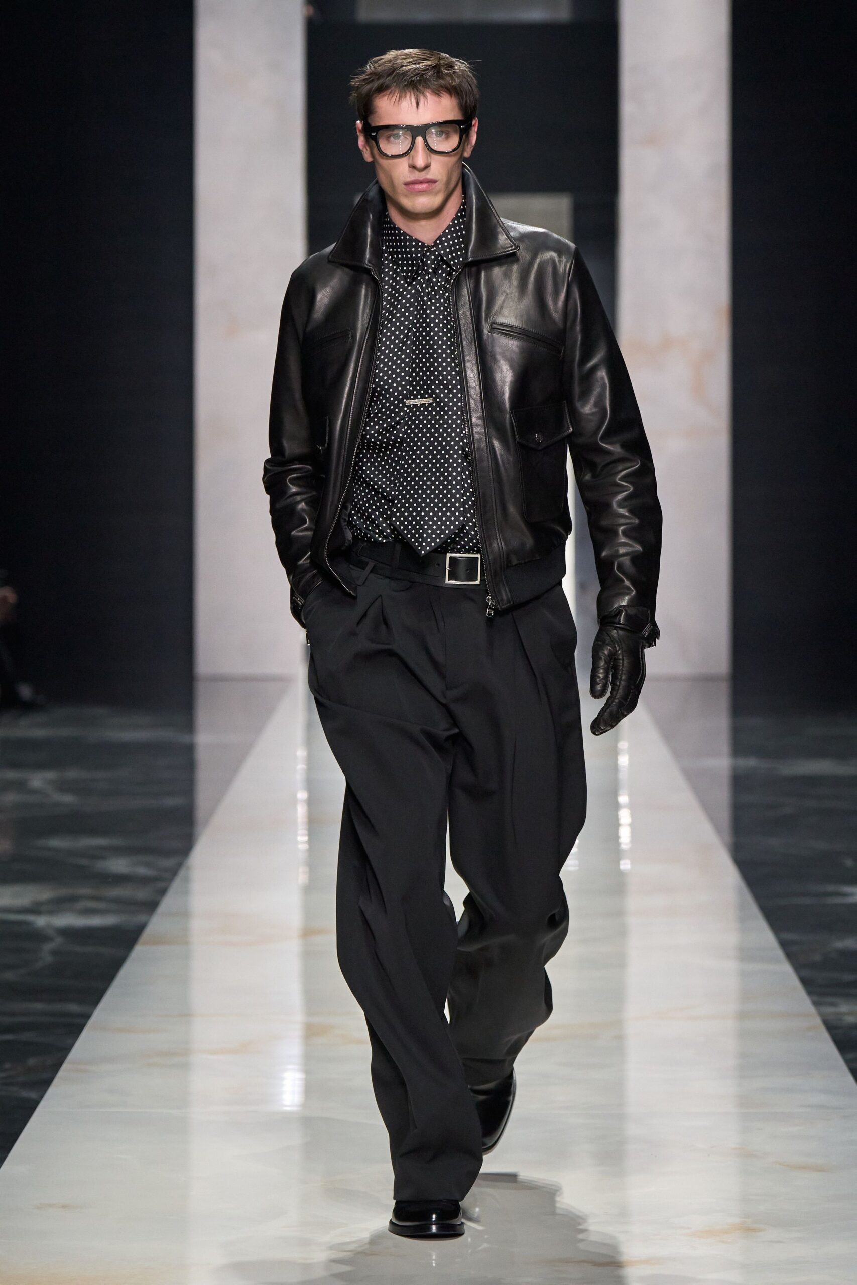 black leather jacket with polka-dot shirt