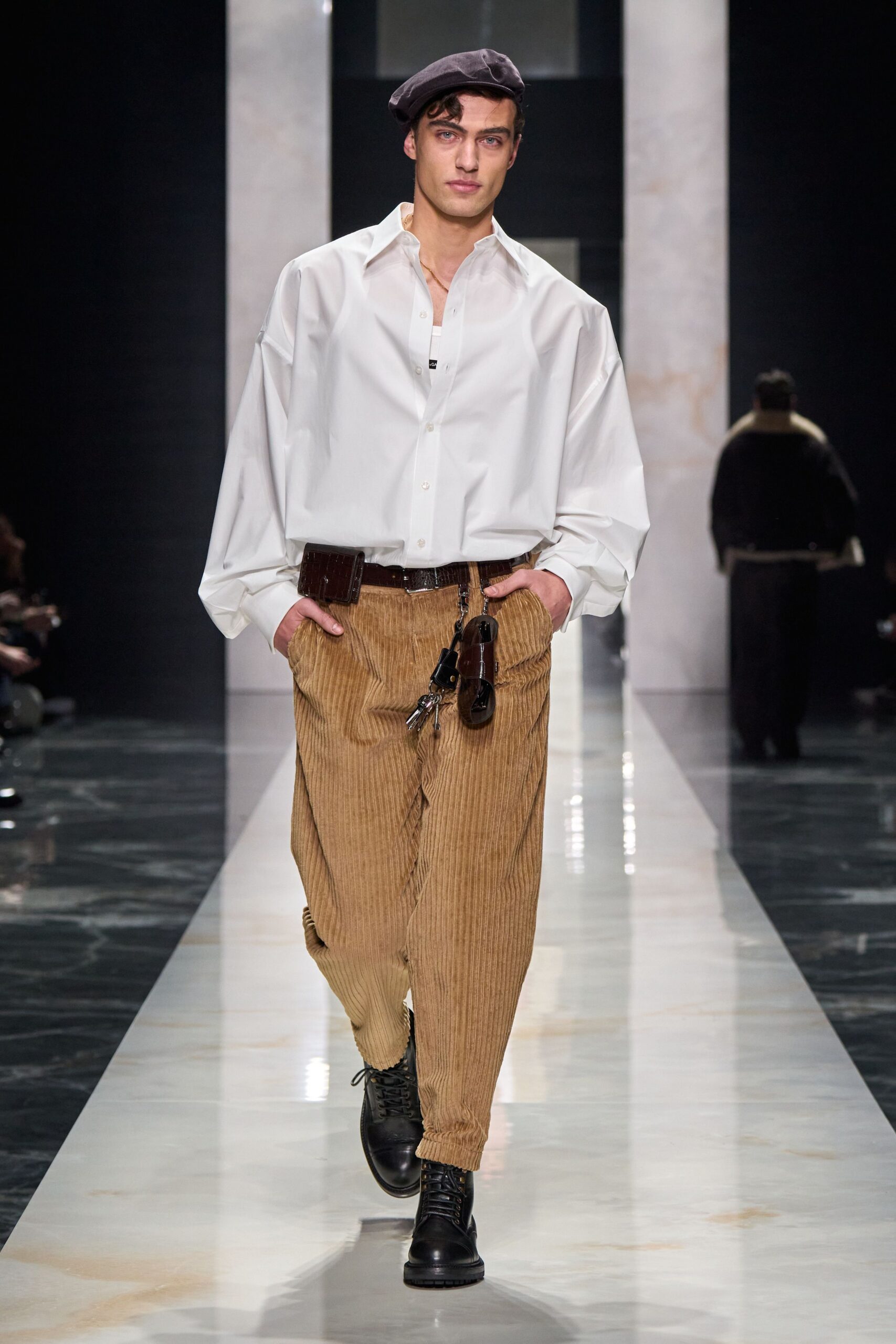 white relaxed shirt beige pants