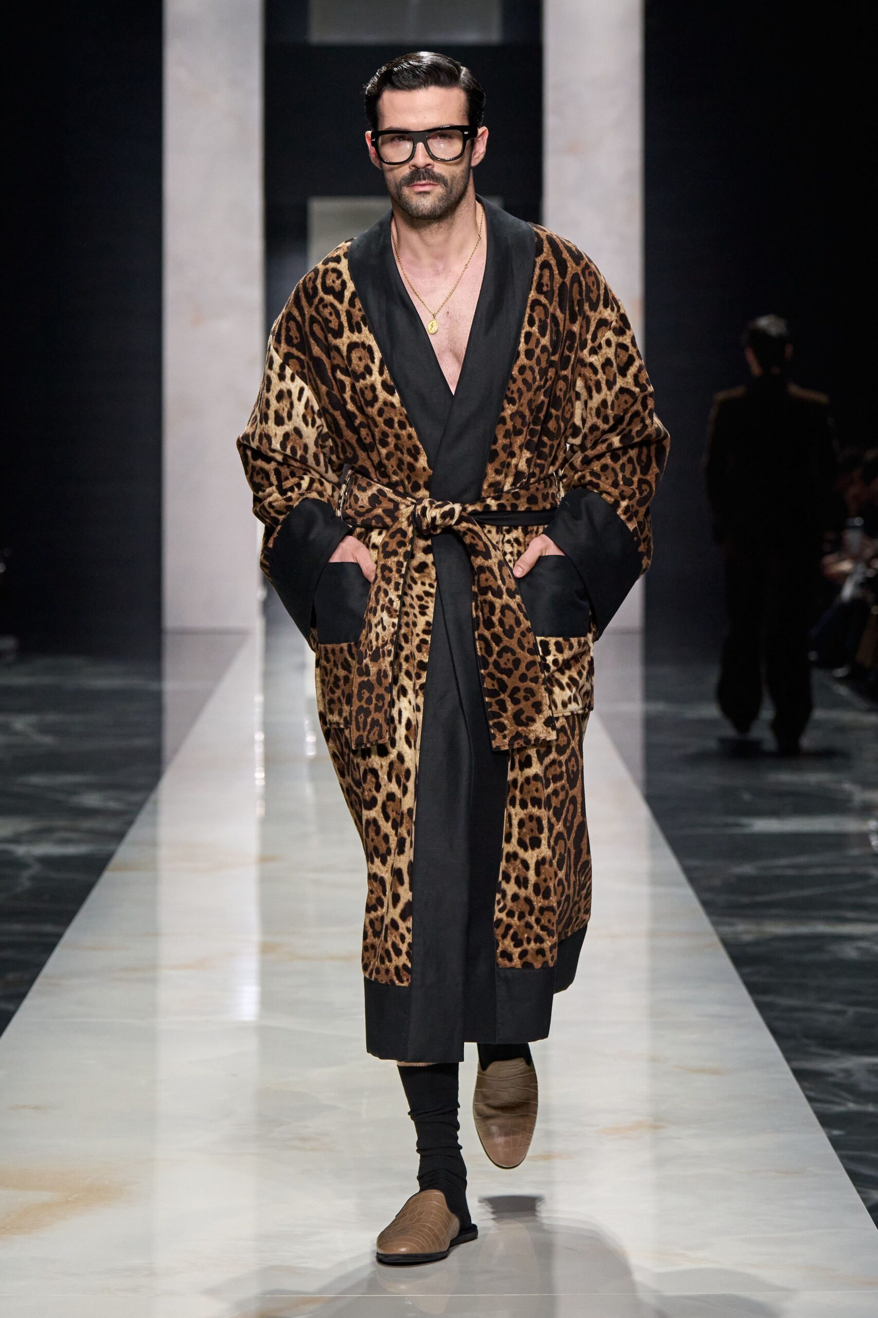 brown animal-print robe with black pants