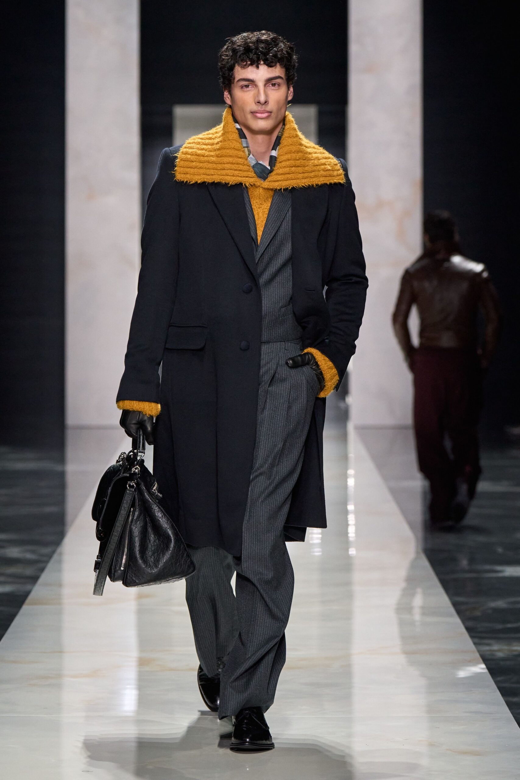 black coat yellow sweater gray suit