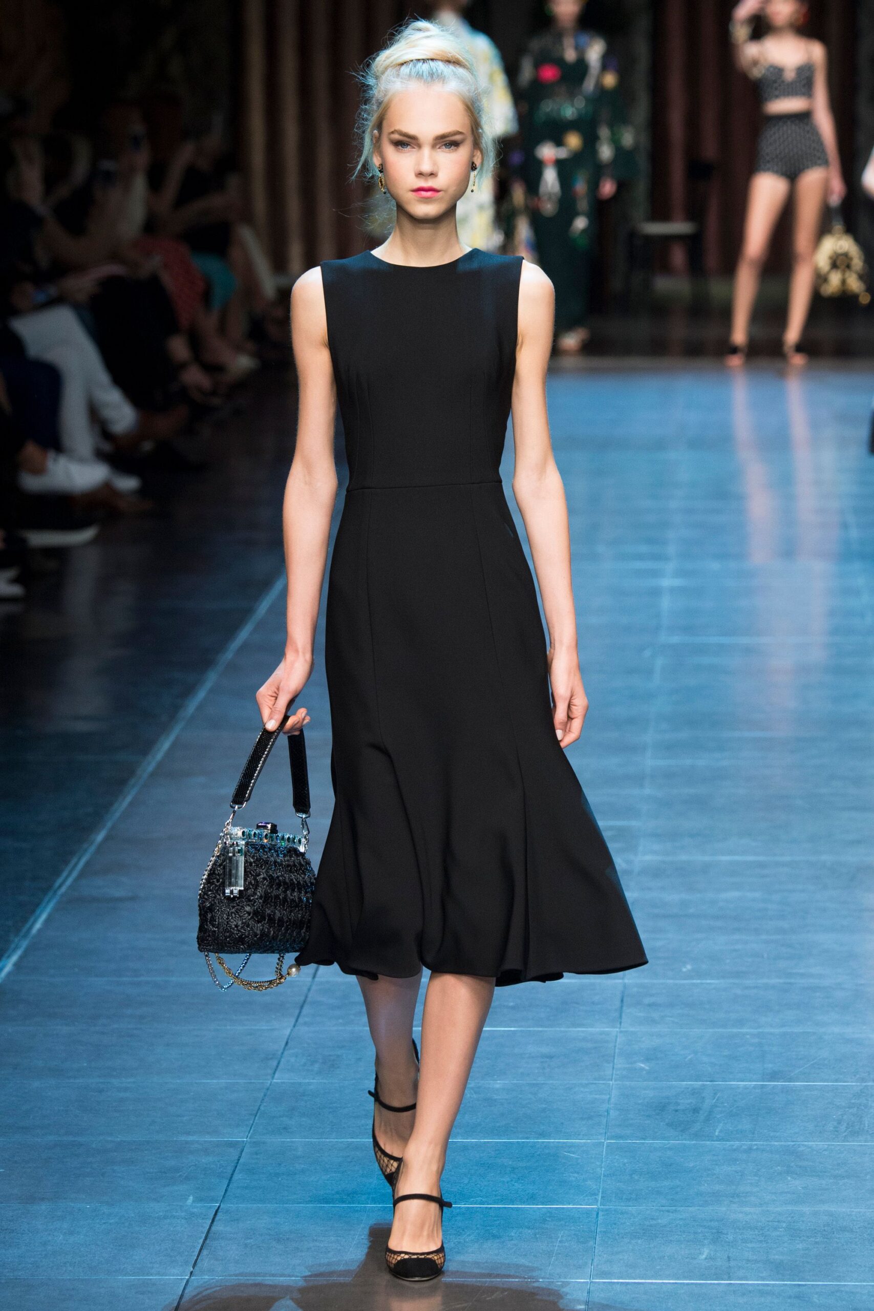 black fitted midi dress with bag