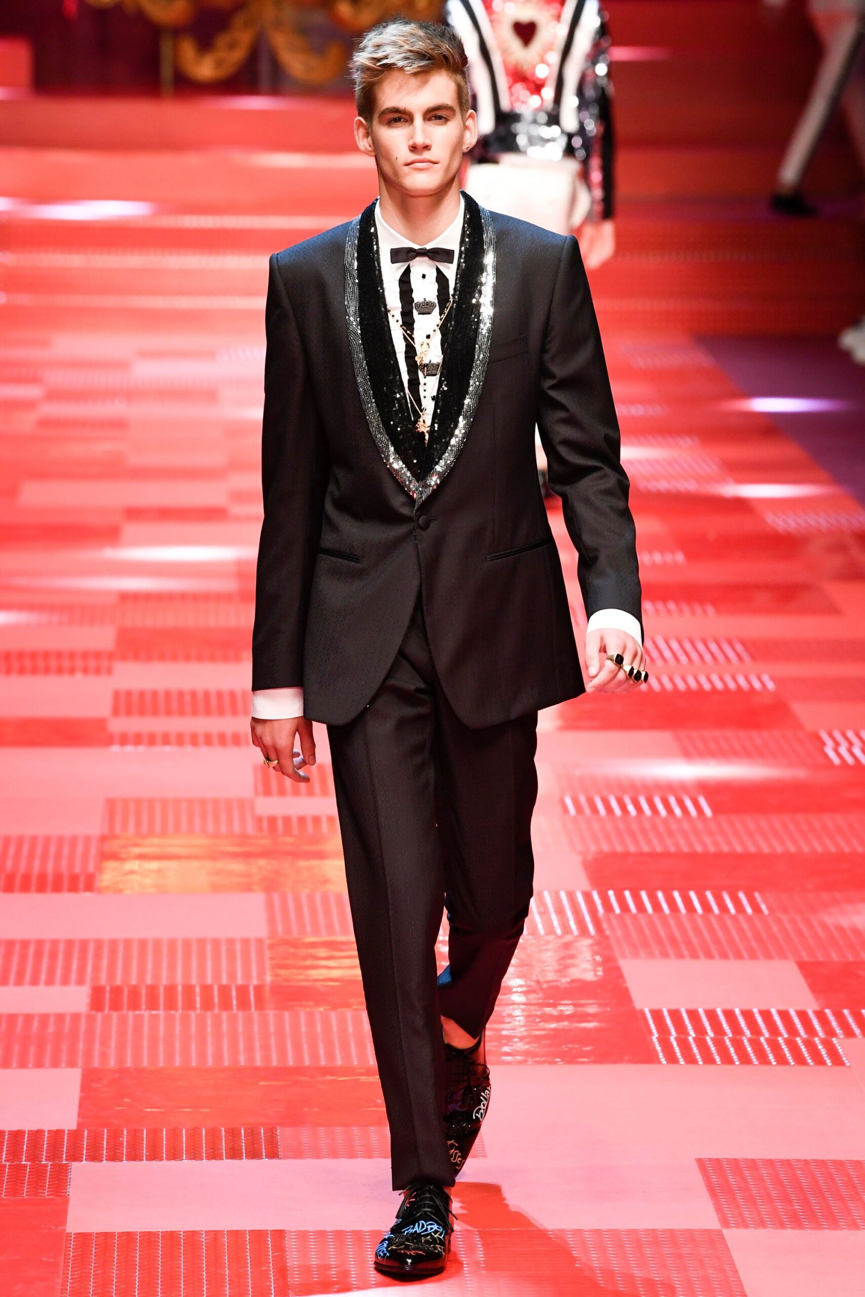 black tailored suit with embellished shoes