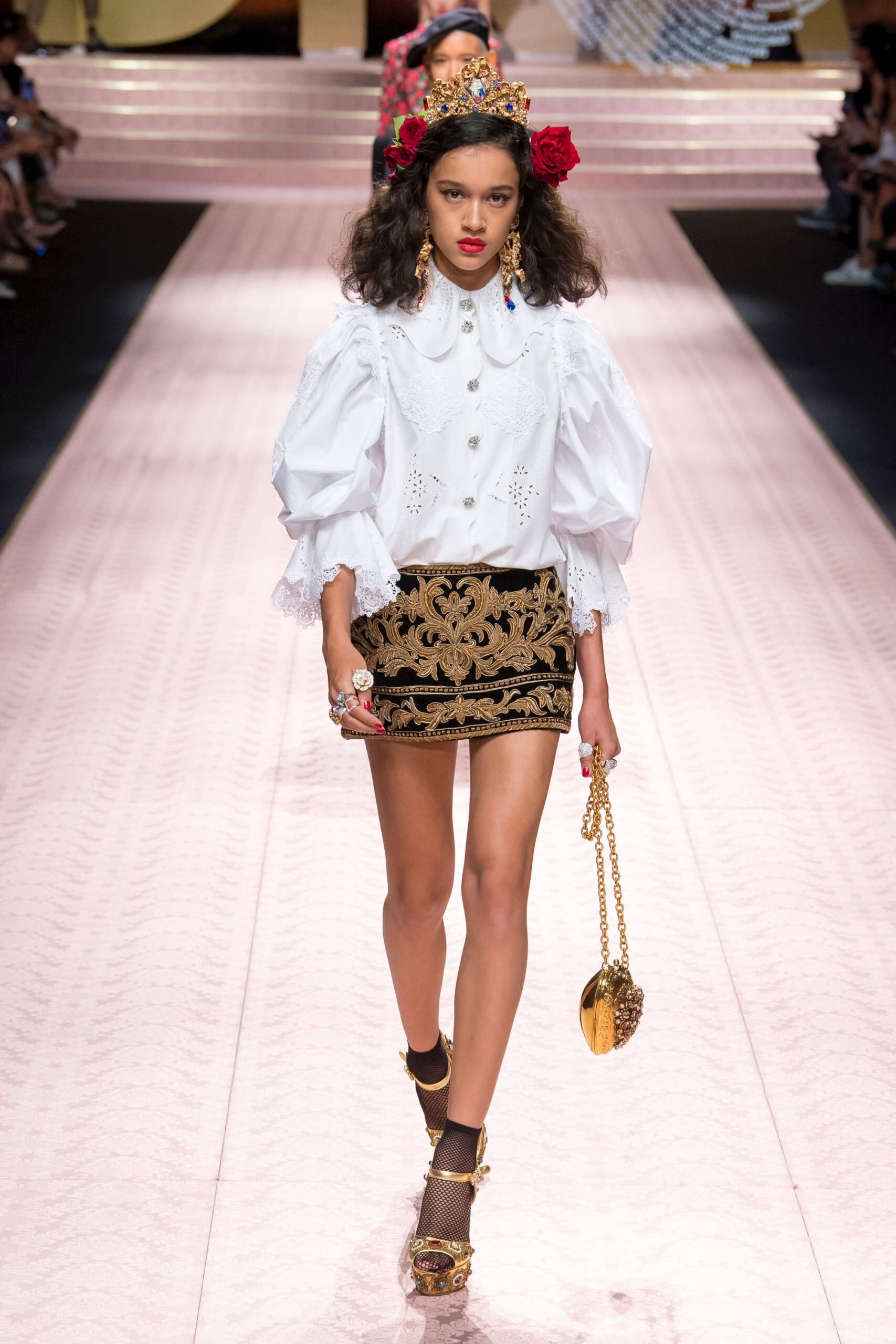 white embroidered blouse and black mini skirt