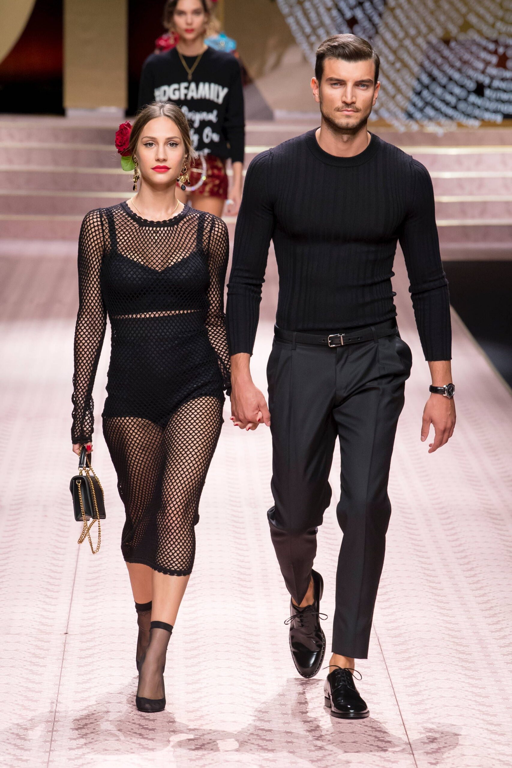 black mesh catsuit and fitted shirt