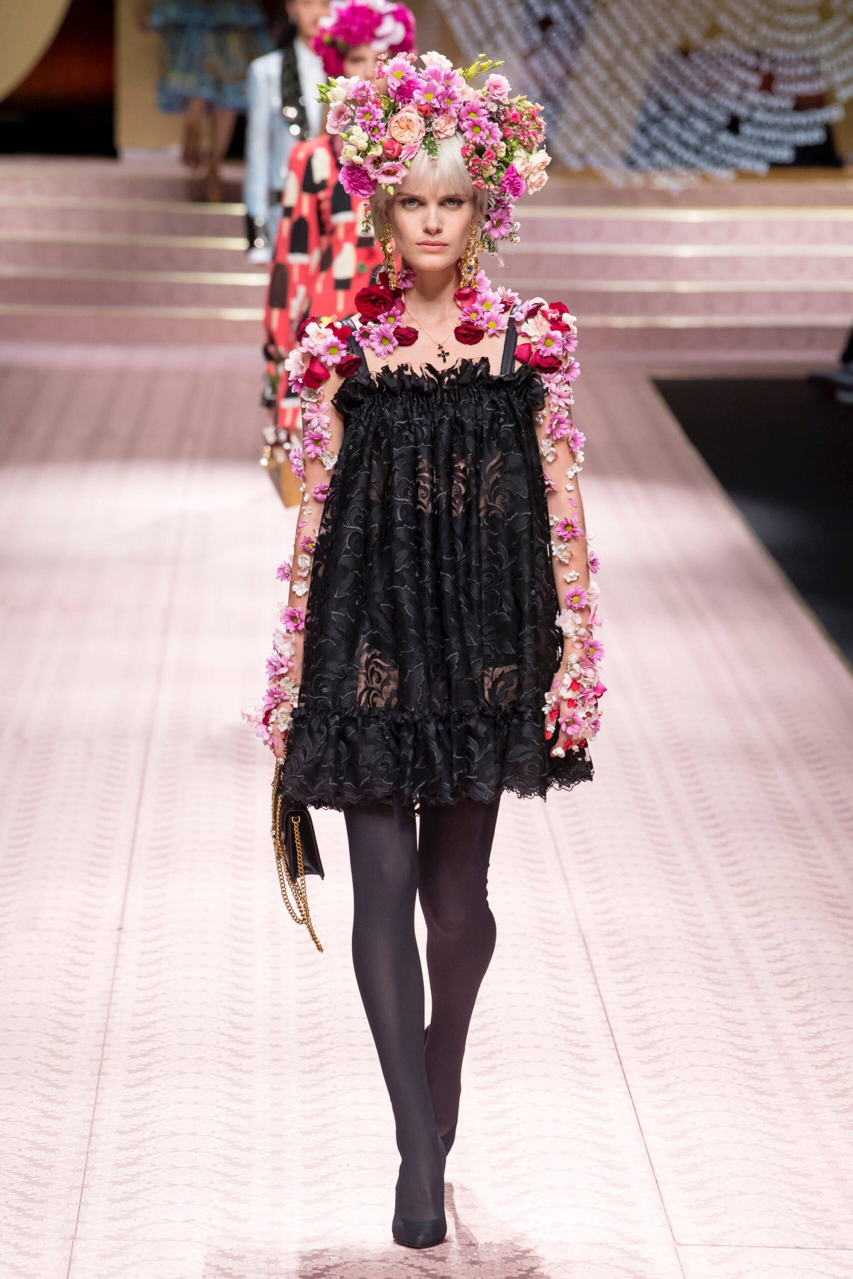 black lace mini dress with floral hat