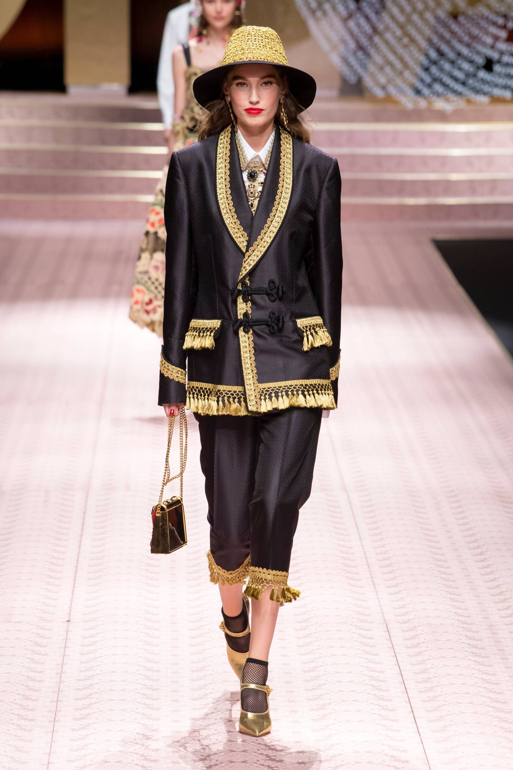 black and gold tailored suit