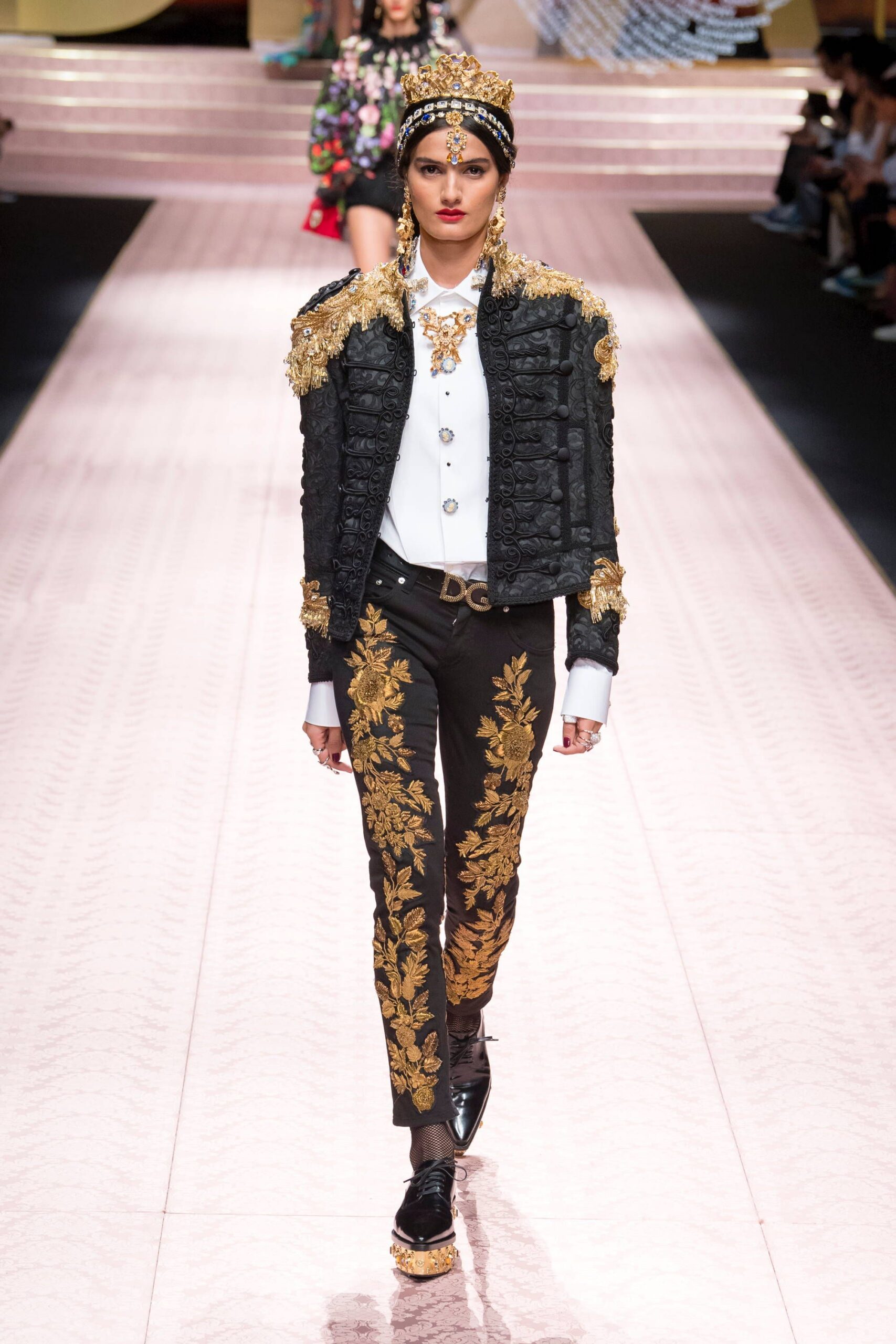 black leather jacket with embroidered pants
