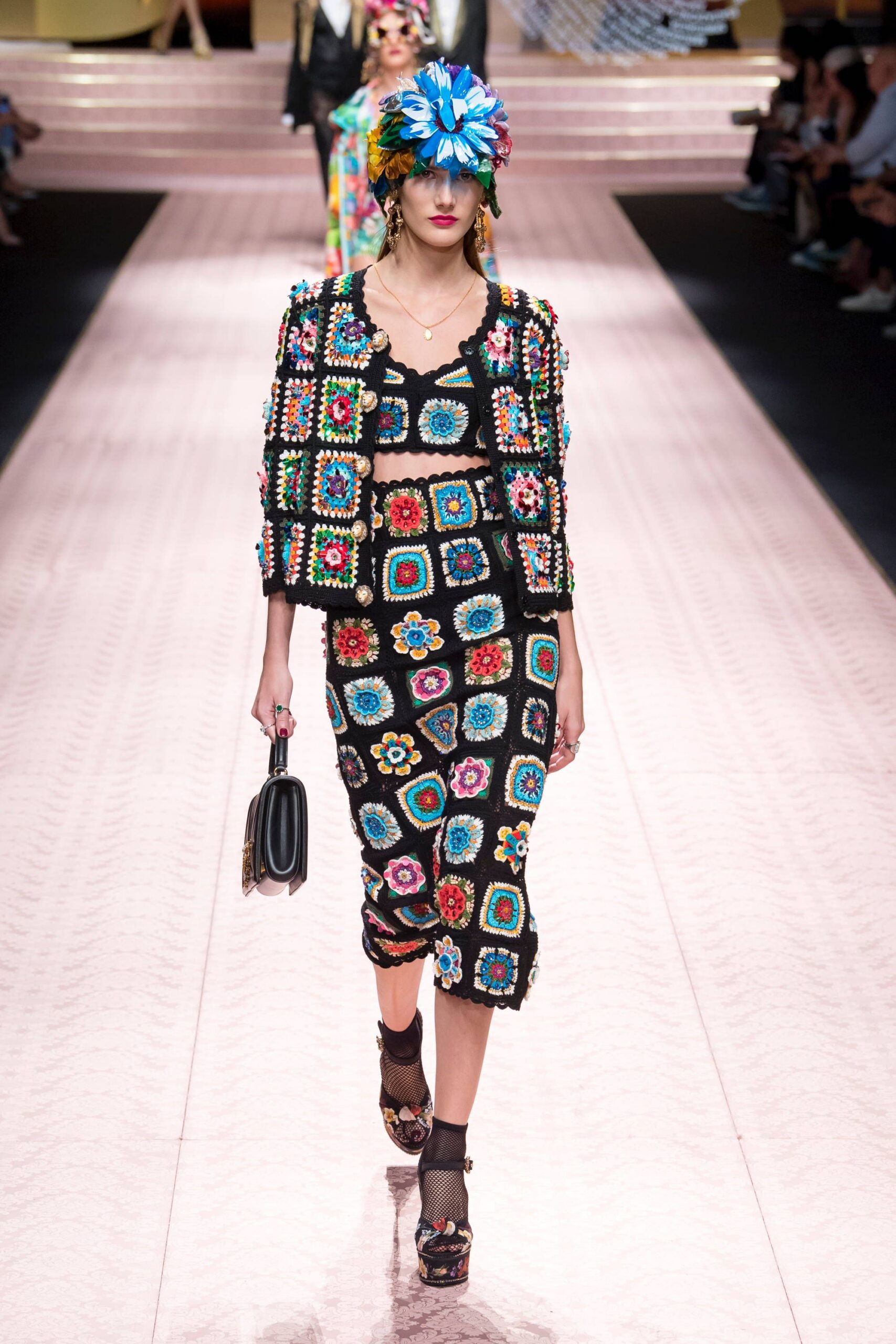 embroidered black jacket and skirt