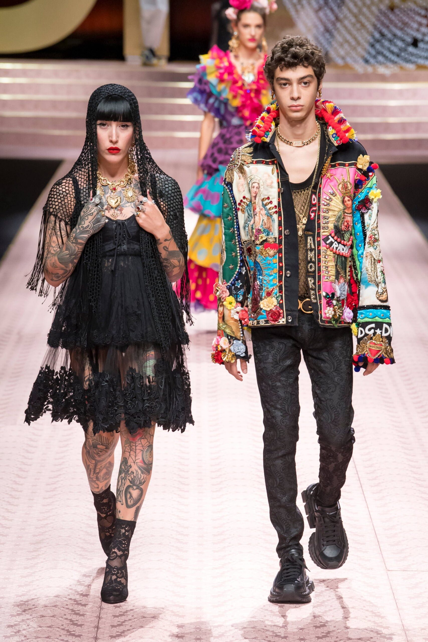 black lace mini dress and embroidered jacket