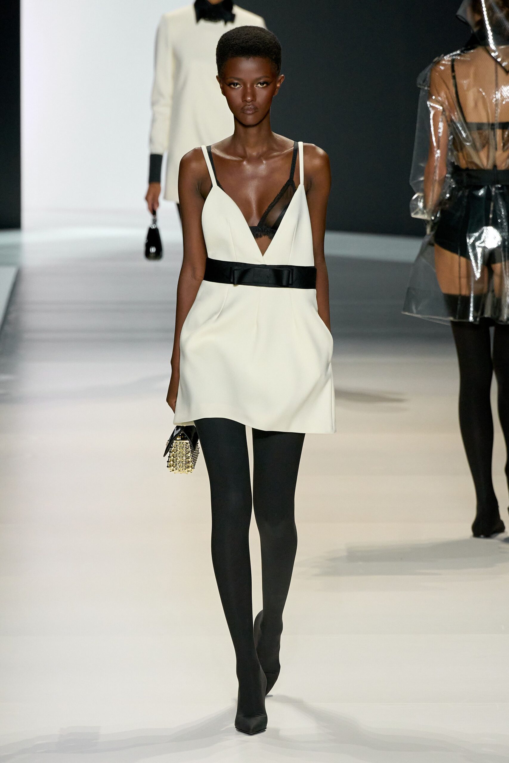 white silk sleeveless v-neck fitted belted a-line dress