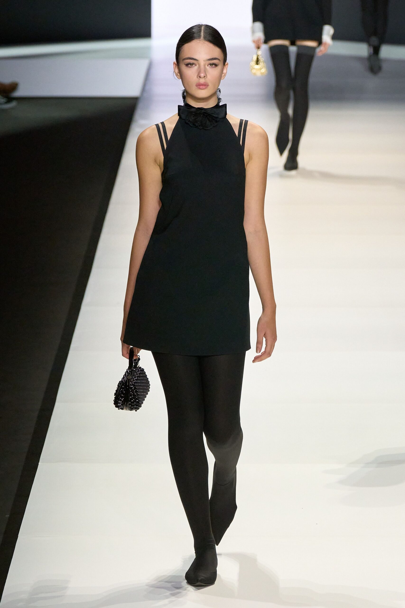 black cotton sleeveless high-neck fitted pleated mini dress