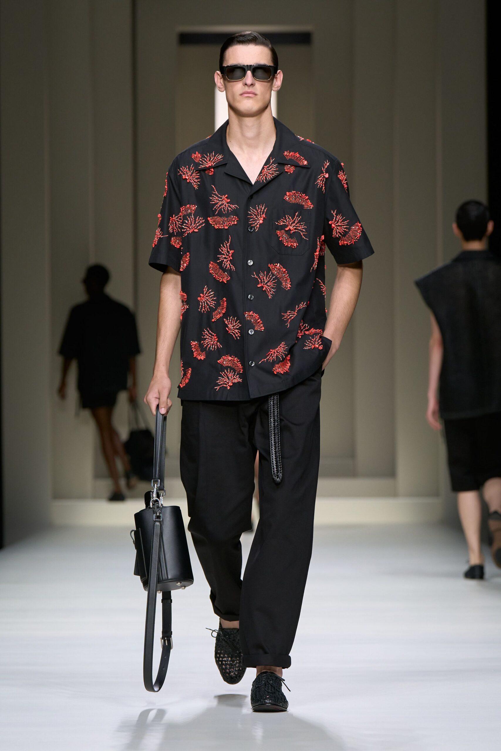 black and red printed shirt with relaxed pants