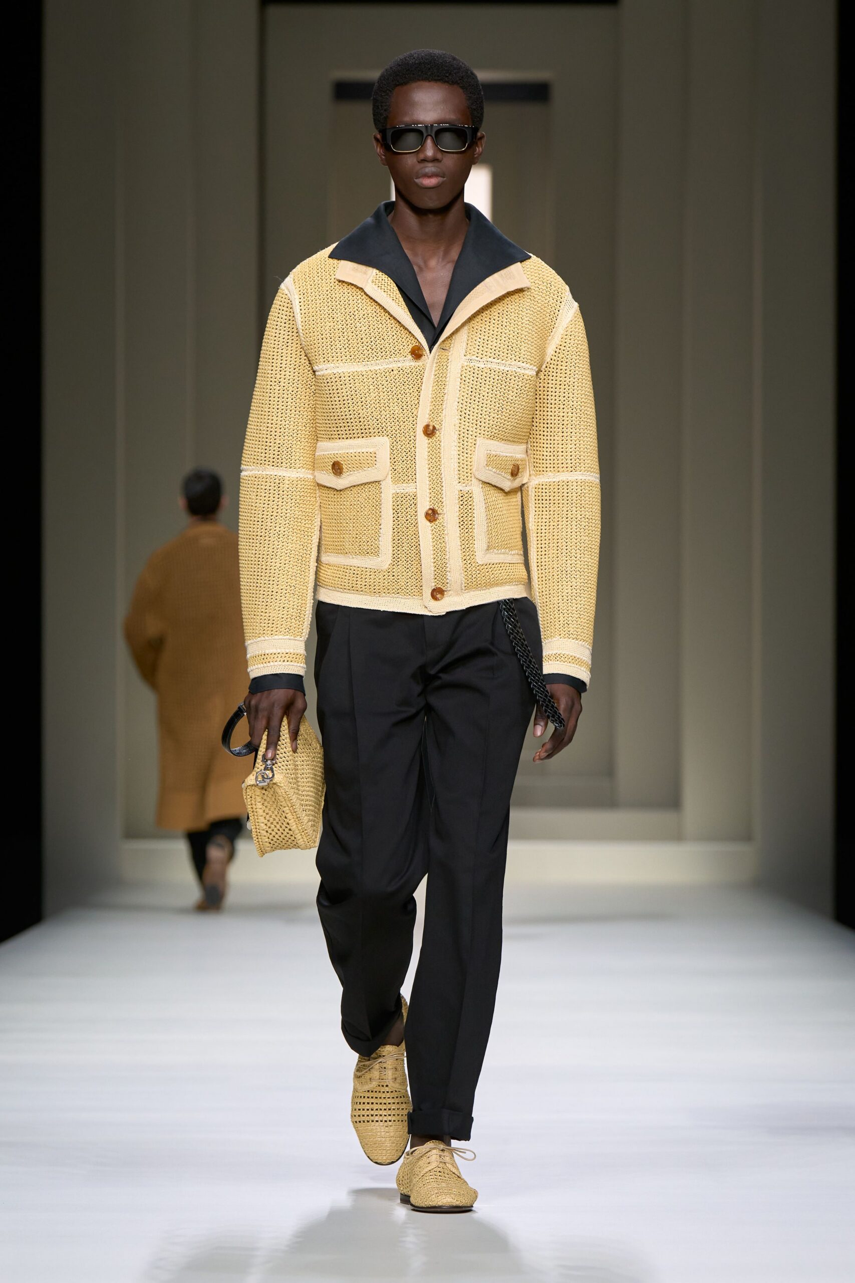 yellow relaxed jacket with black pants