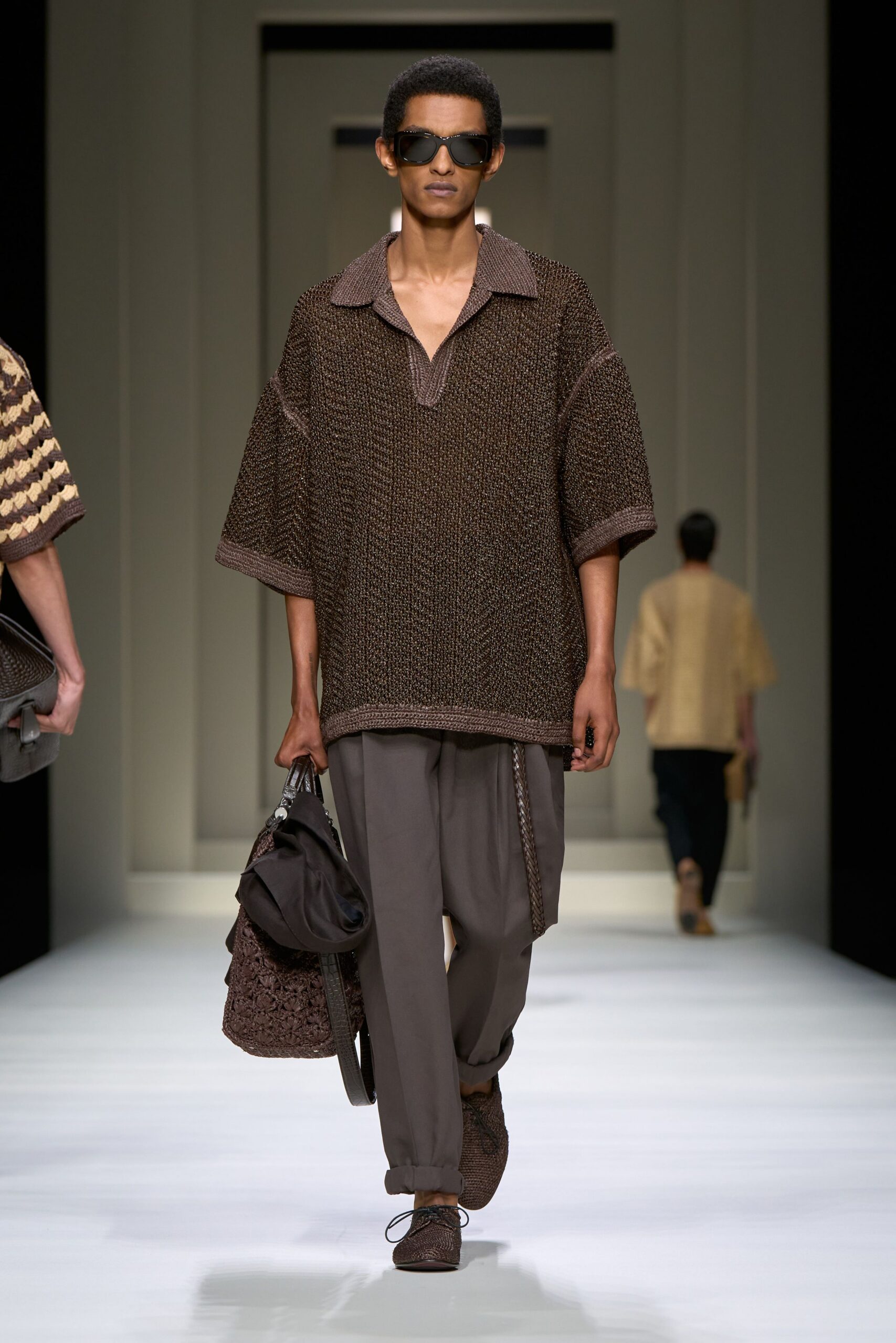 brown relaxed top with gray pants