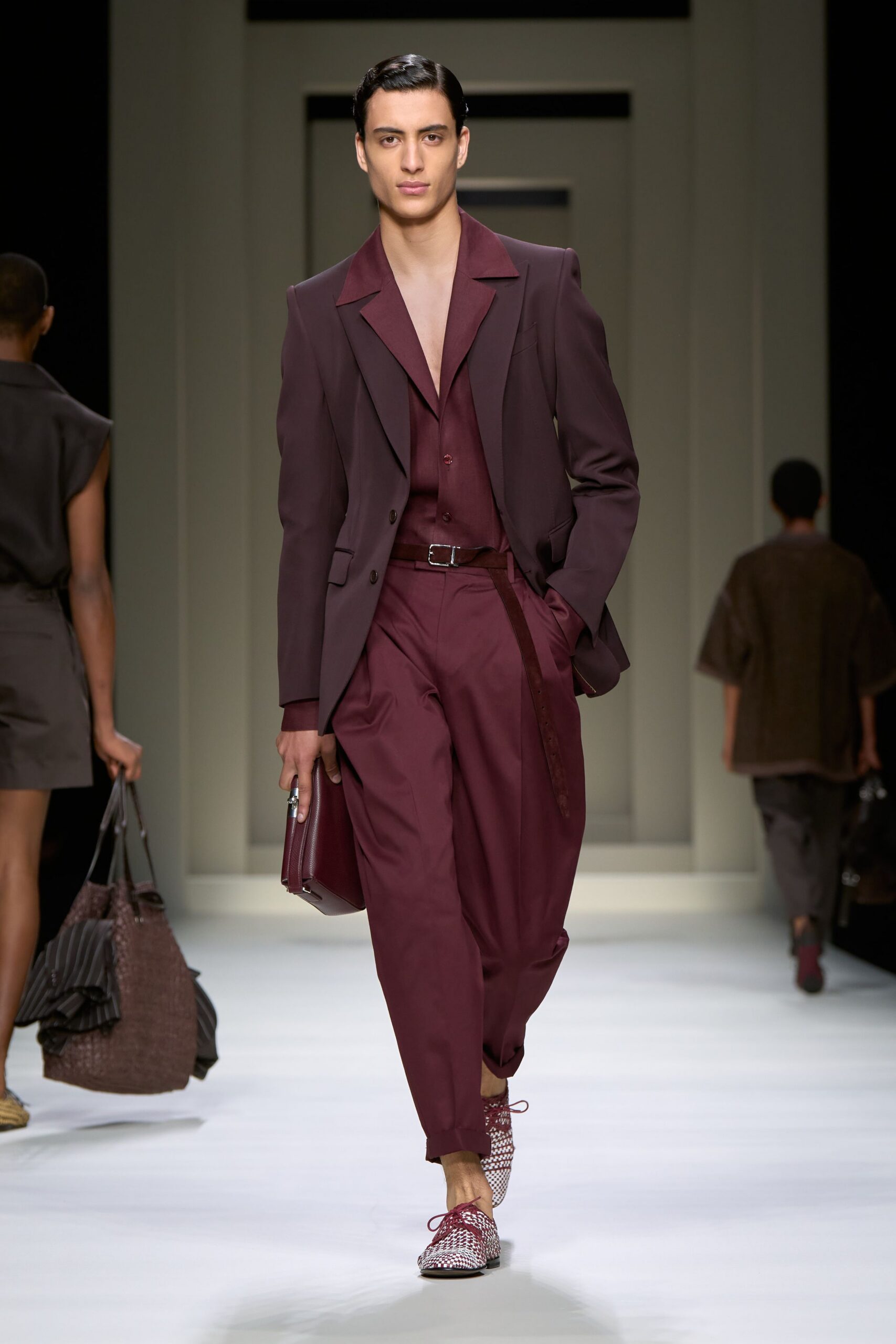 maroon tailored suit with printed shoes